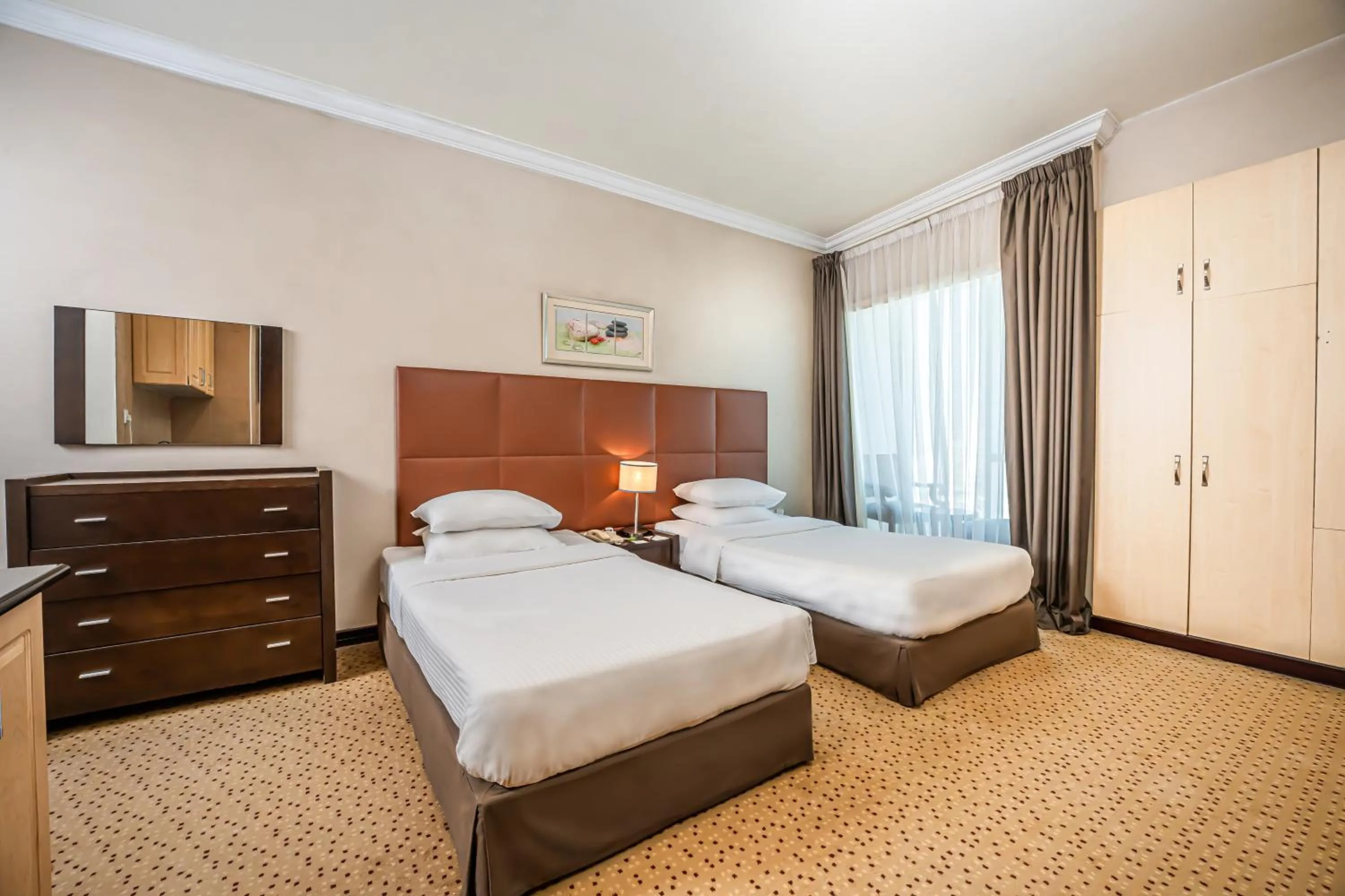 Deluxe Twin Room in Kingsgate Hotel Doha by Millennium Hotels