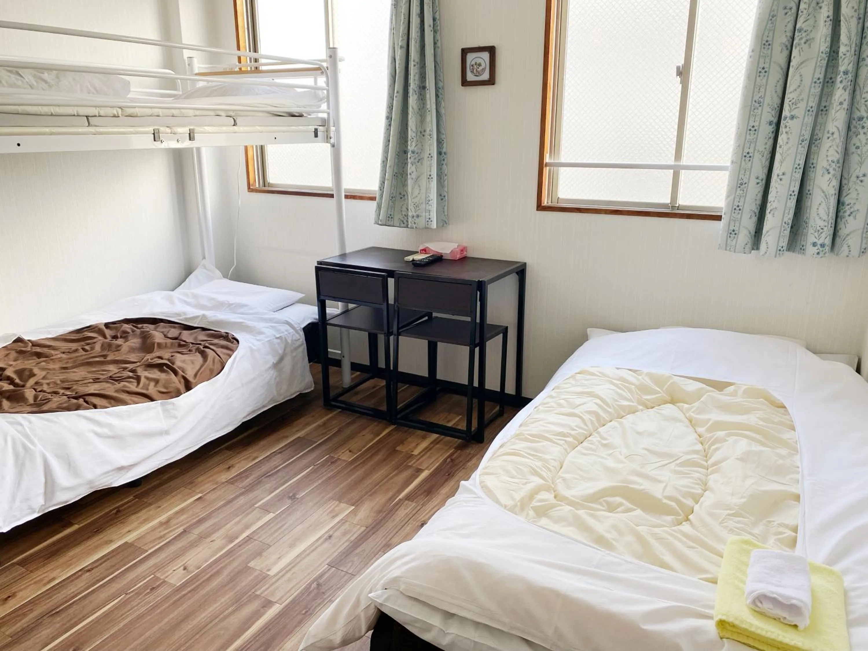 Economy Triple Room with Shared Bathroom in Hotel Mikado