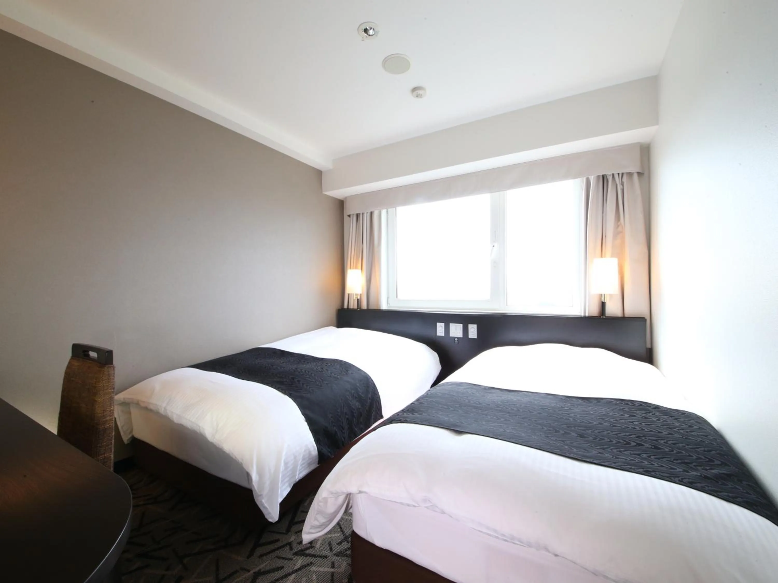 Twin Room in West Wing - single occupancy - Smoking  in APA Hotel & Resort Tokyo Bay Makuhari