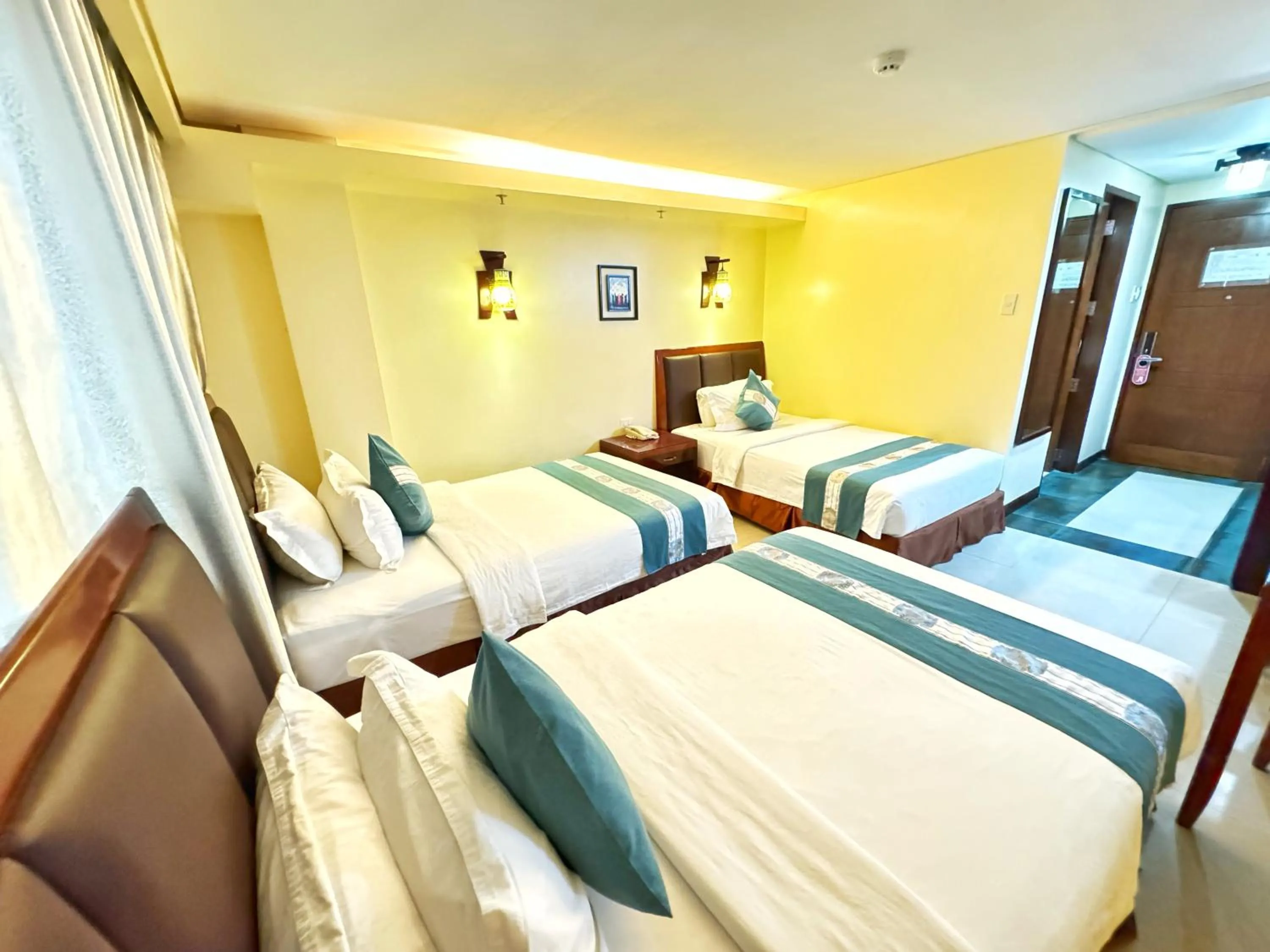 Triple Family Room in Golden Phoenix Hotel Boracay