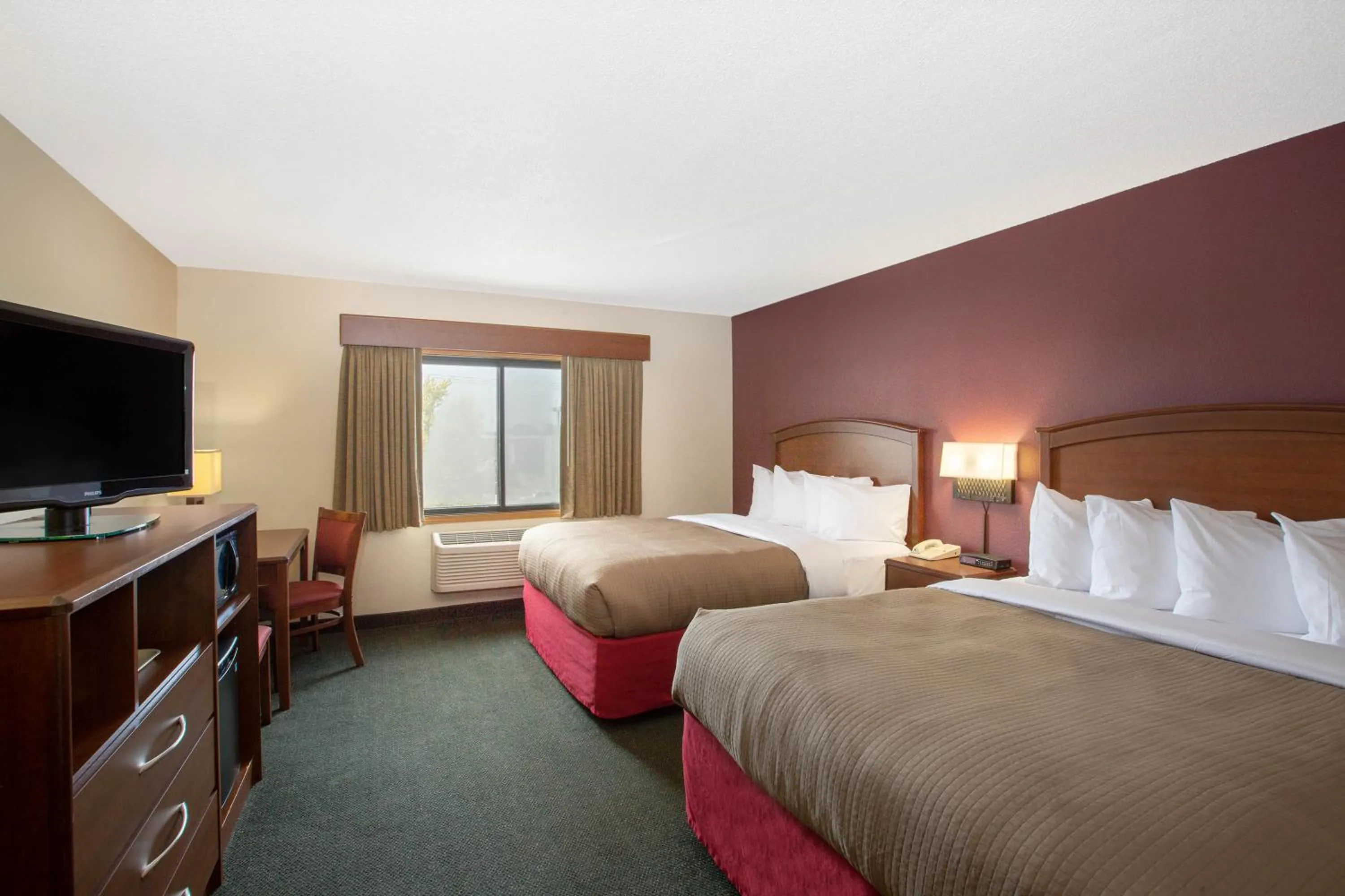 Queen Room with Two Queen Beds - Pet Friendly/Non-Smoking in AmericInn by Wyndham Kearney