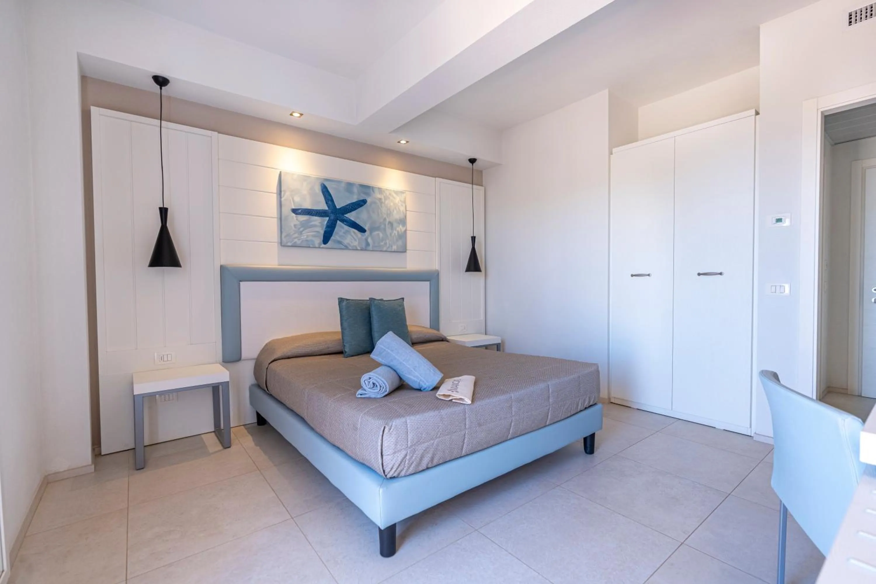 Superior Triple Room with Sea View in Mangia's Pollina Resort