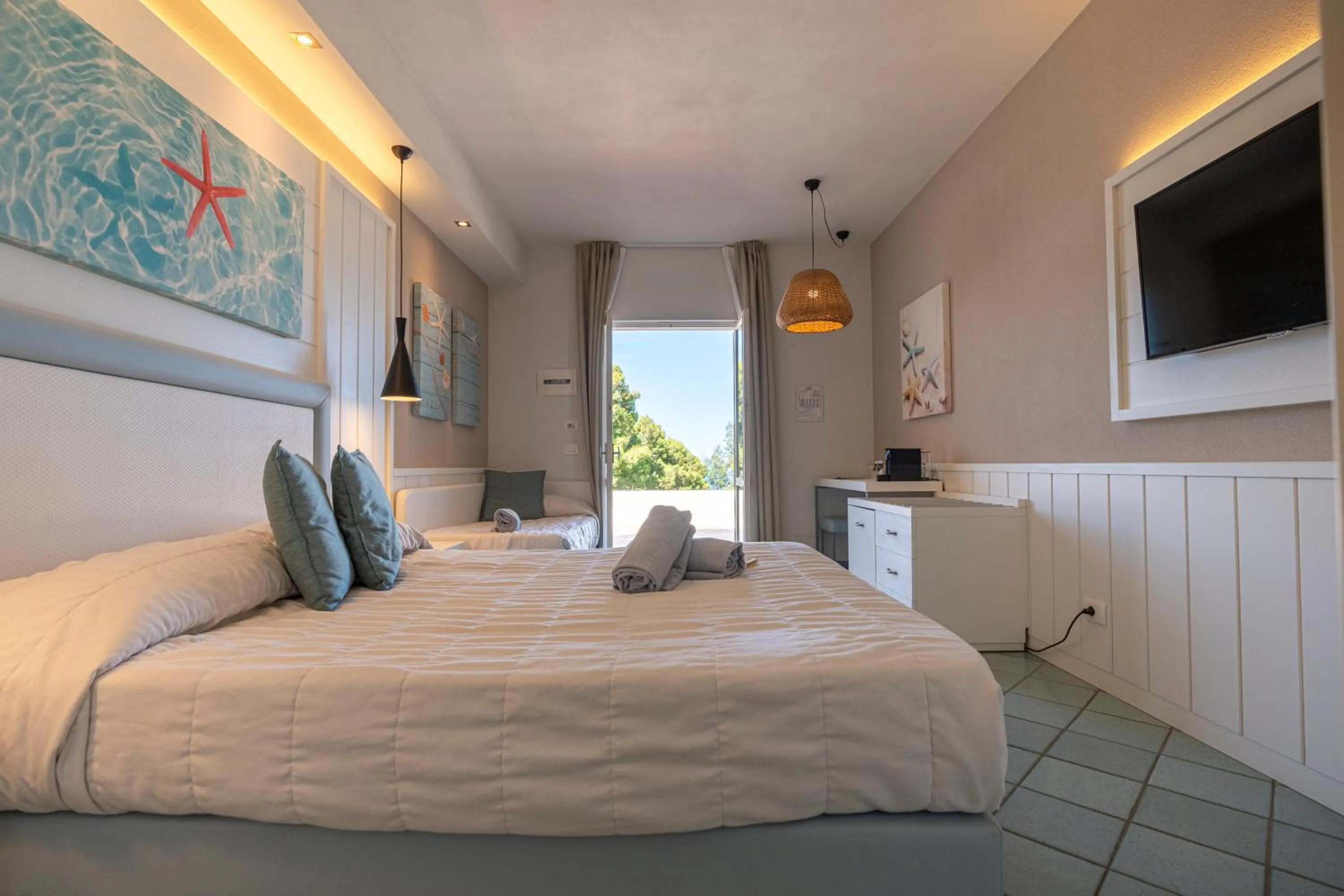 Deluxe Triple Room in Mangia's Pollina Resort