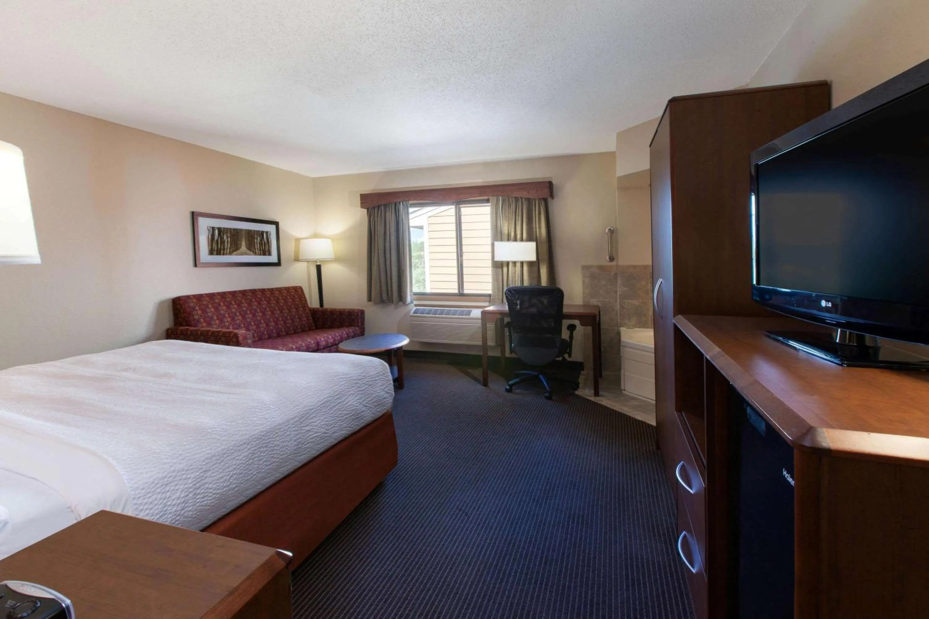 Premier Studio King Suite - Non-Smoking in AmericInn by Wyndham Iron River