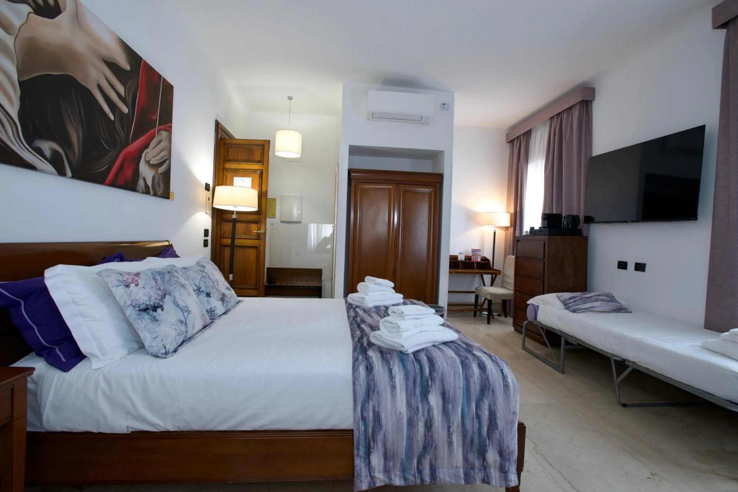 Quadruple Room in St. Peter' Six Rooms & Suites