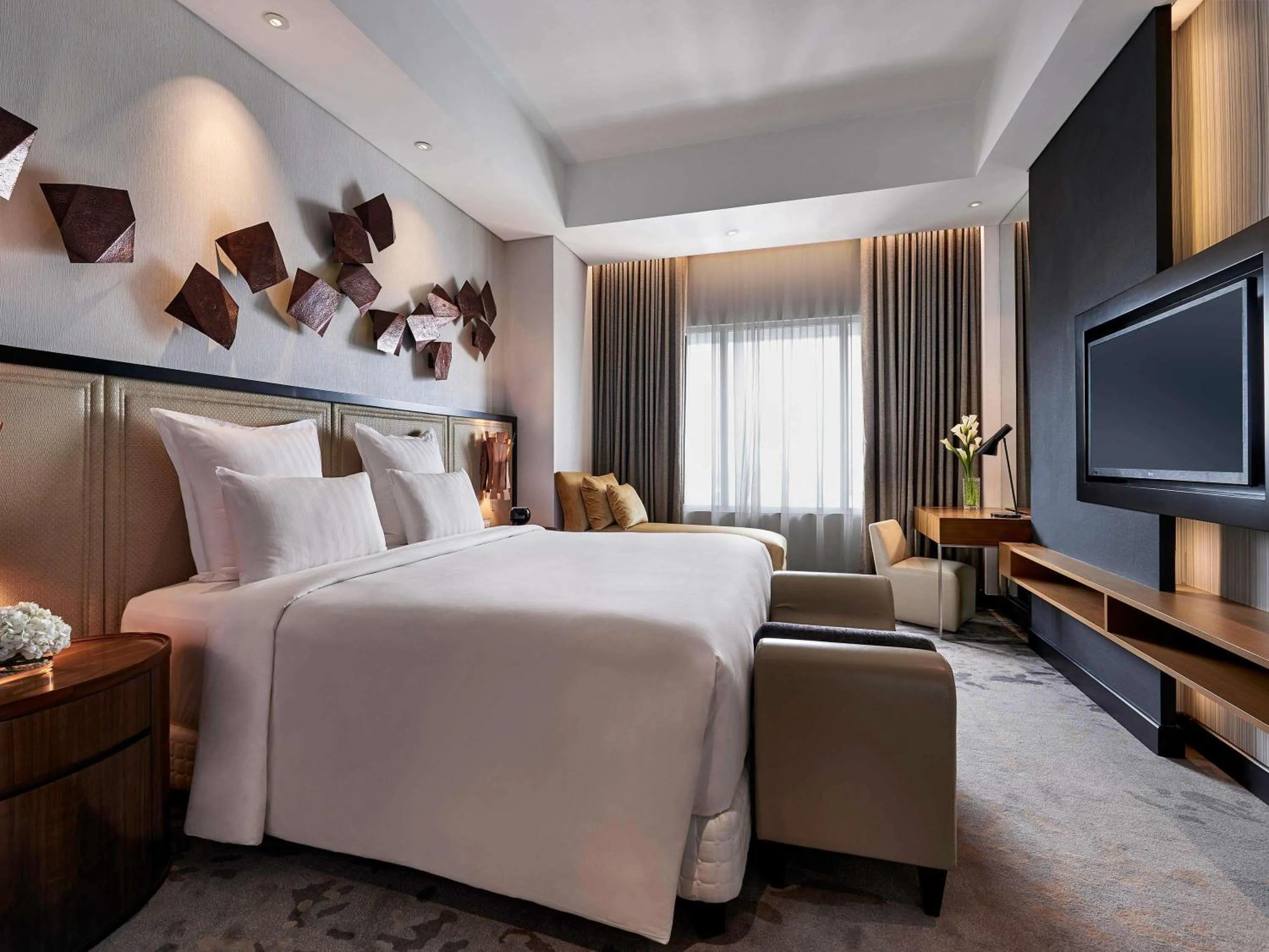 Accent Suite with One King Bed and Two Single Beds - Lounge Access in Pullman Jakarta Indonesia