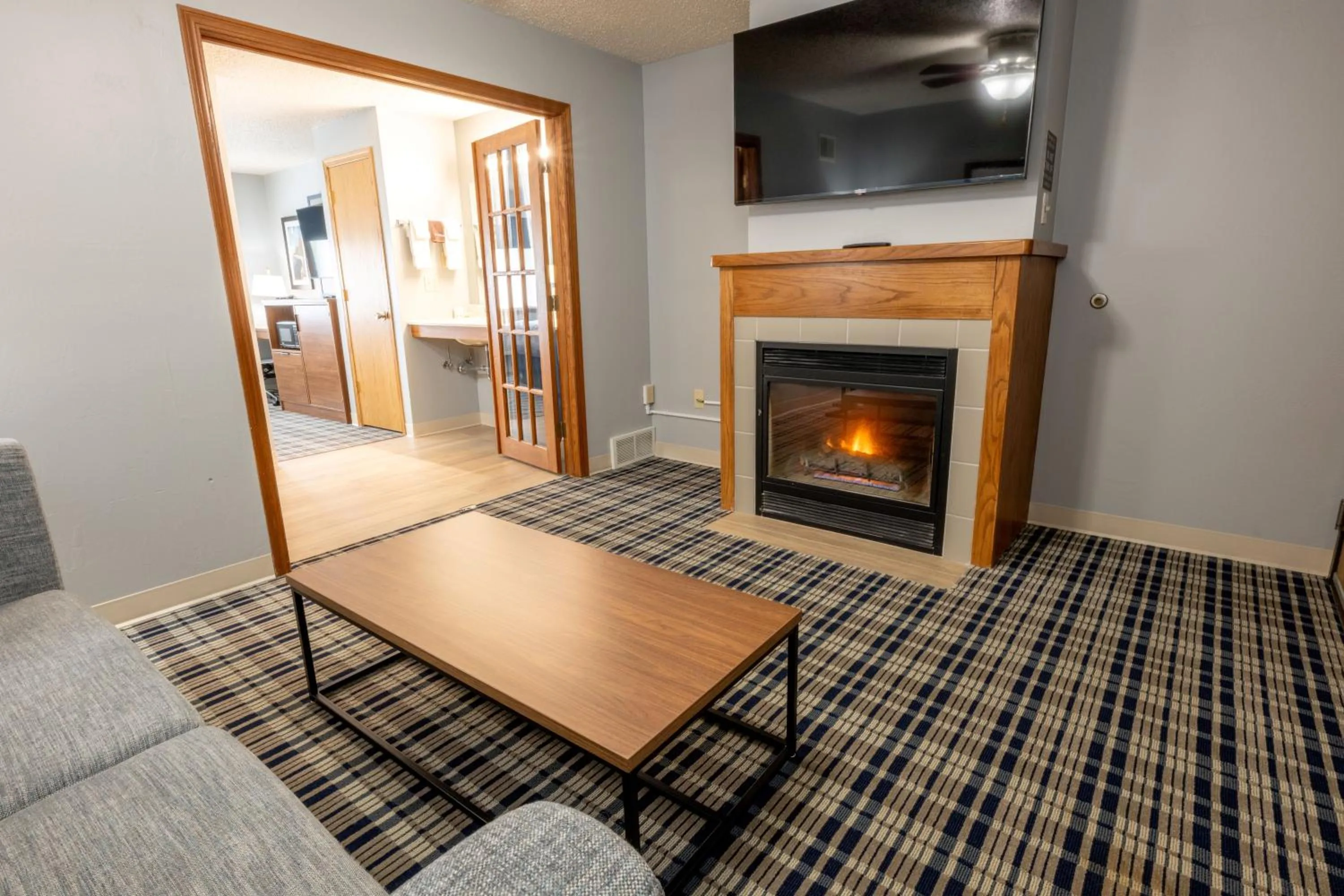 Superior King Suite - Non-Smoking in AmericInn by Wyndham Sturgeon Bay