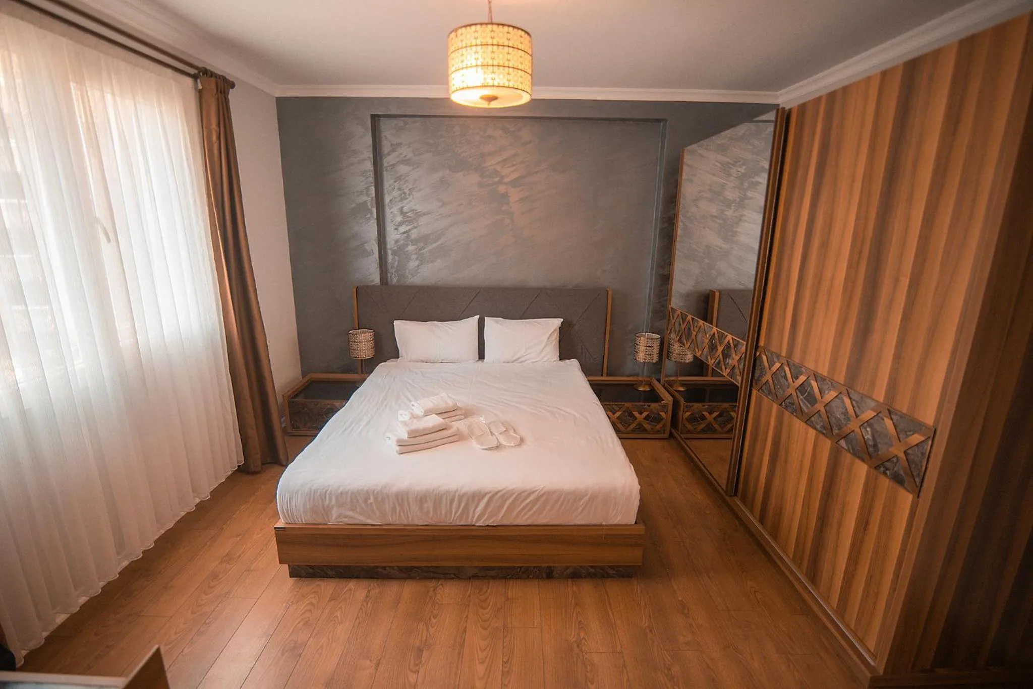 Three-Bedroom Suite with Panoramic View in Royal Comfort Hotel