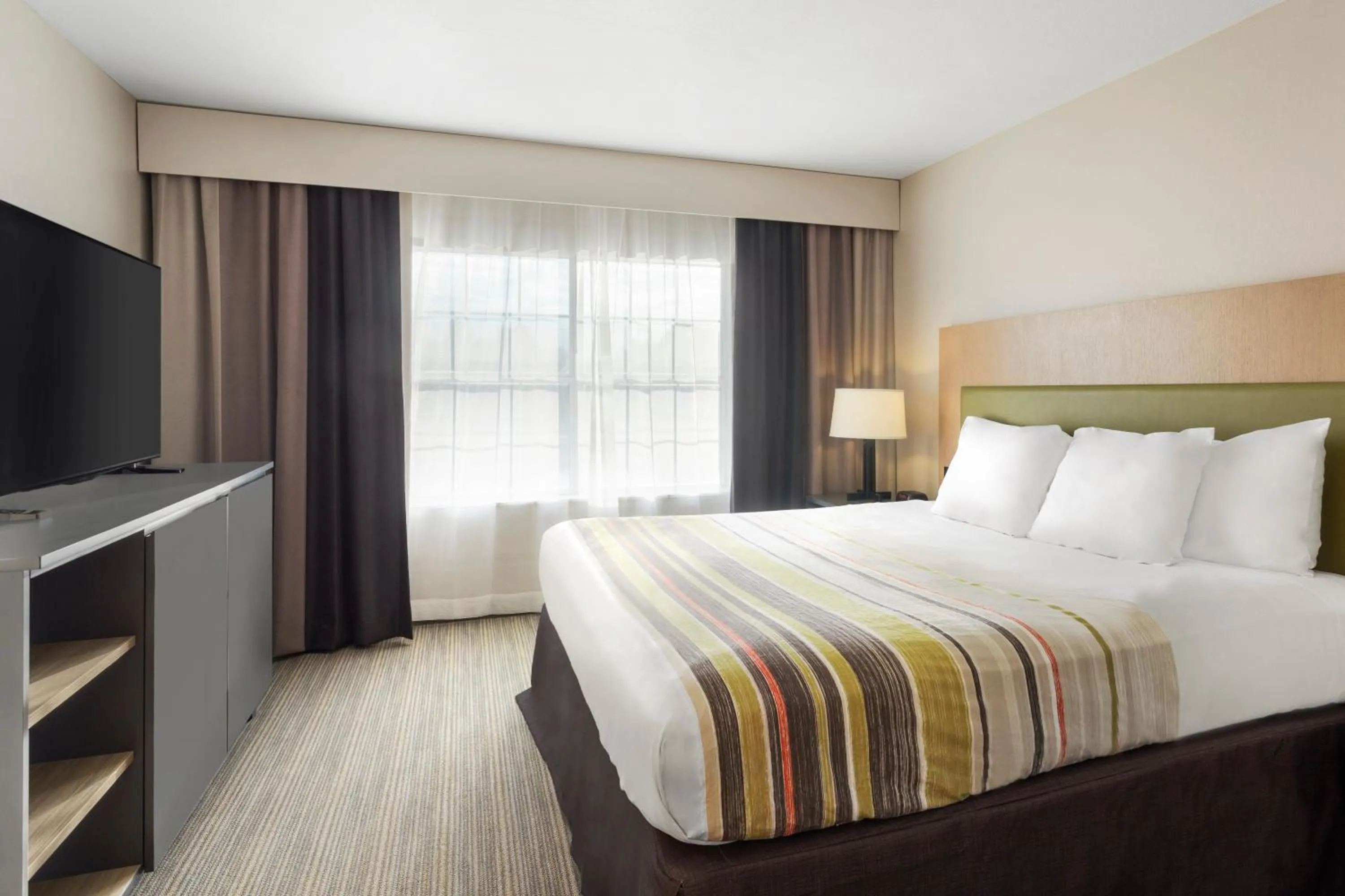 Premium King Suite - Non-Smoking in Country Inn & Suites by Radisson, Jackson-Airport, MS