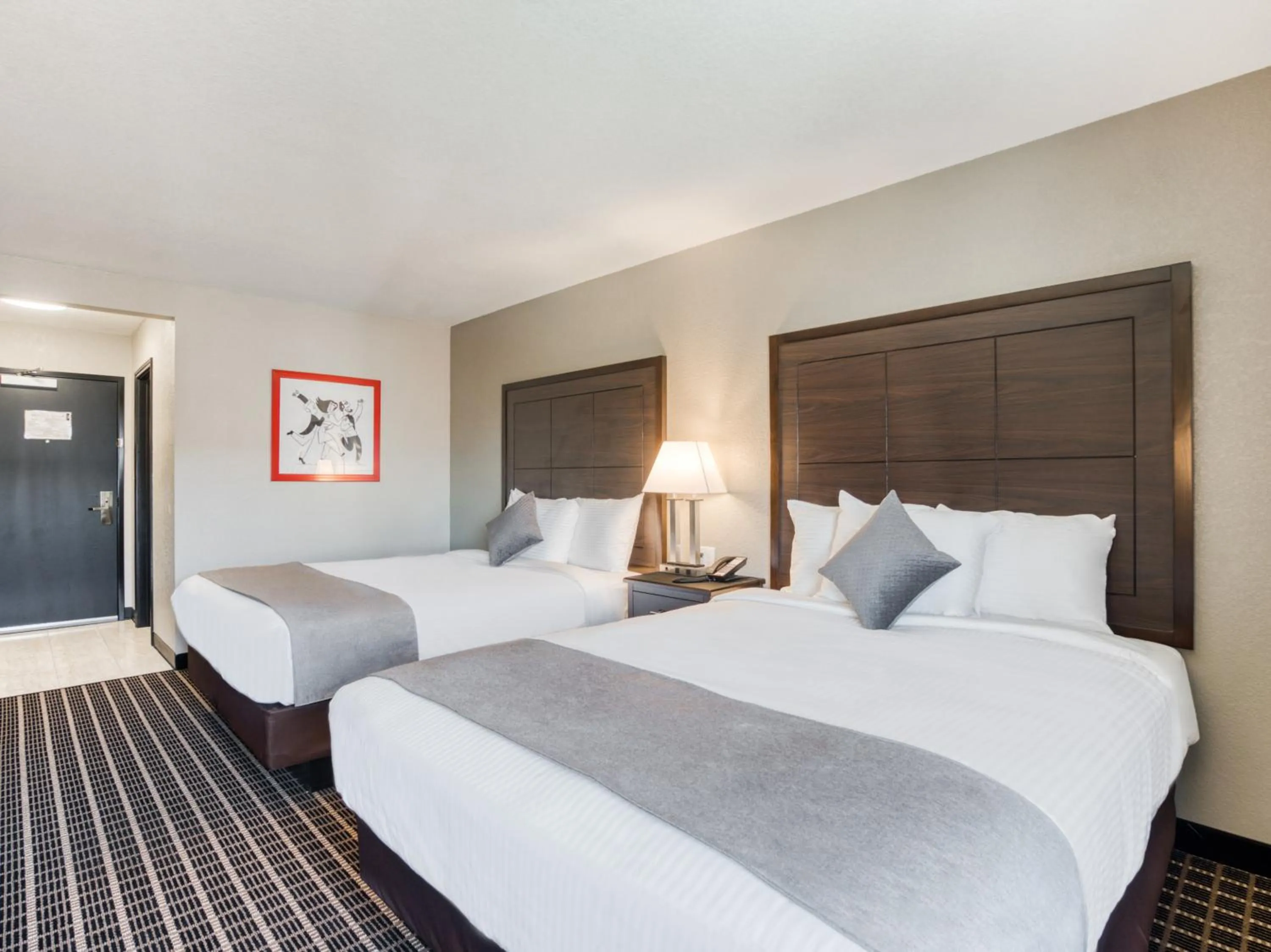 Queen Room with Two Queen Beds in Alexis Hotel & Banquets Dallas Park Central Galleria