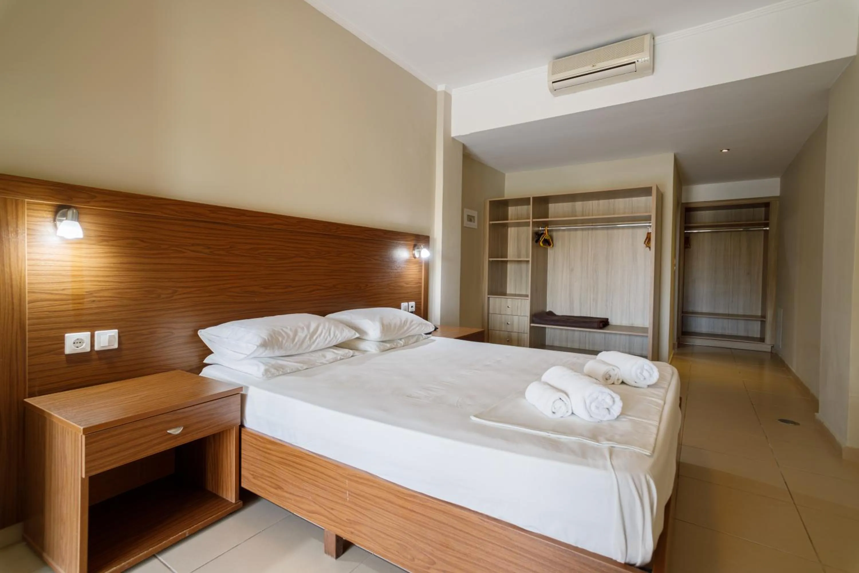 Bed in Hermes Hotel