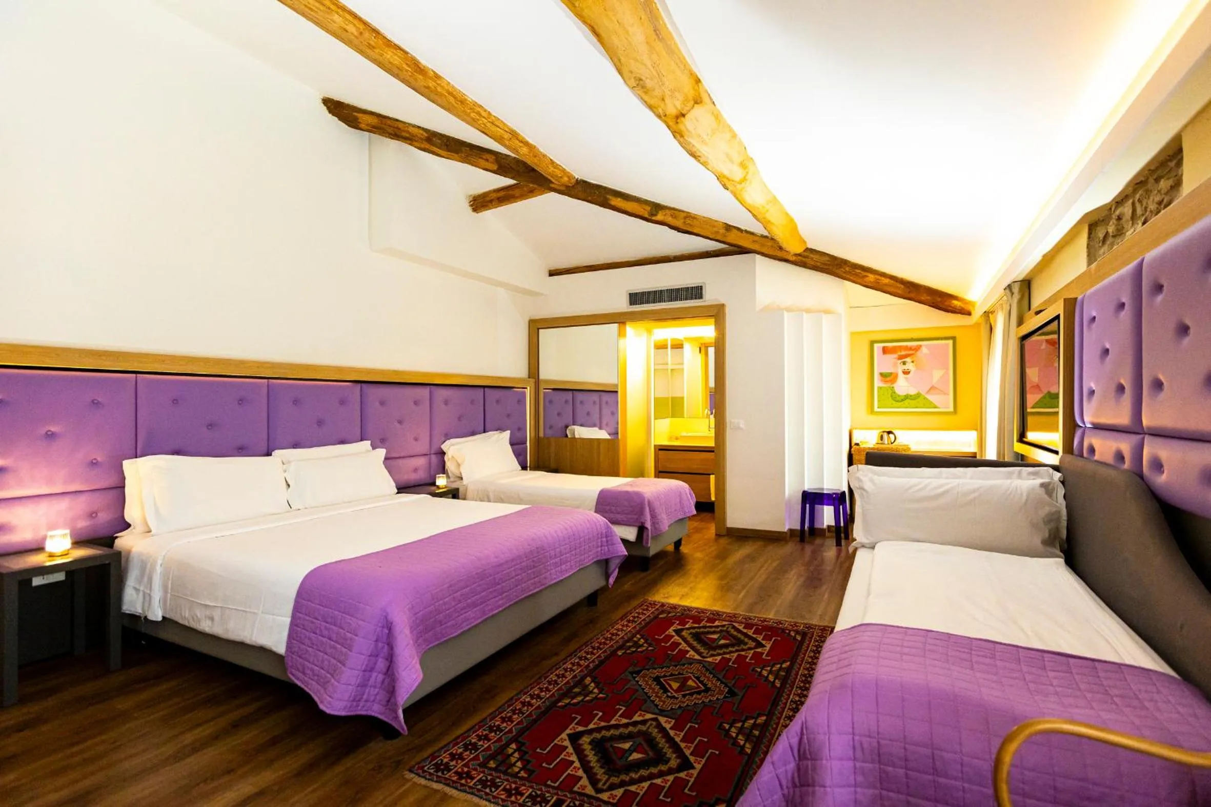 Quadruple Room in Hotel Corona