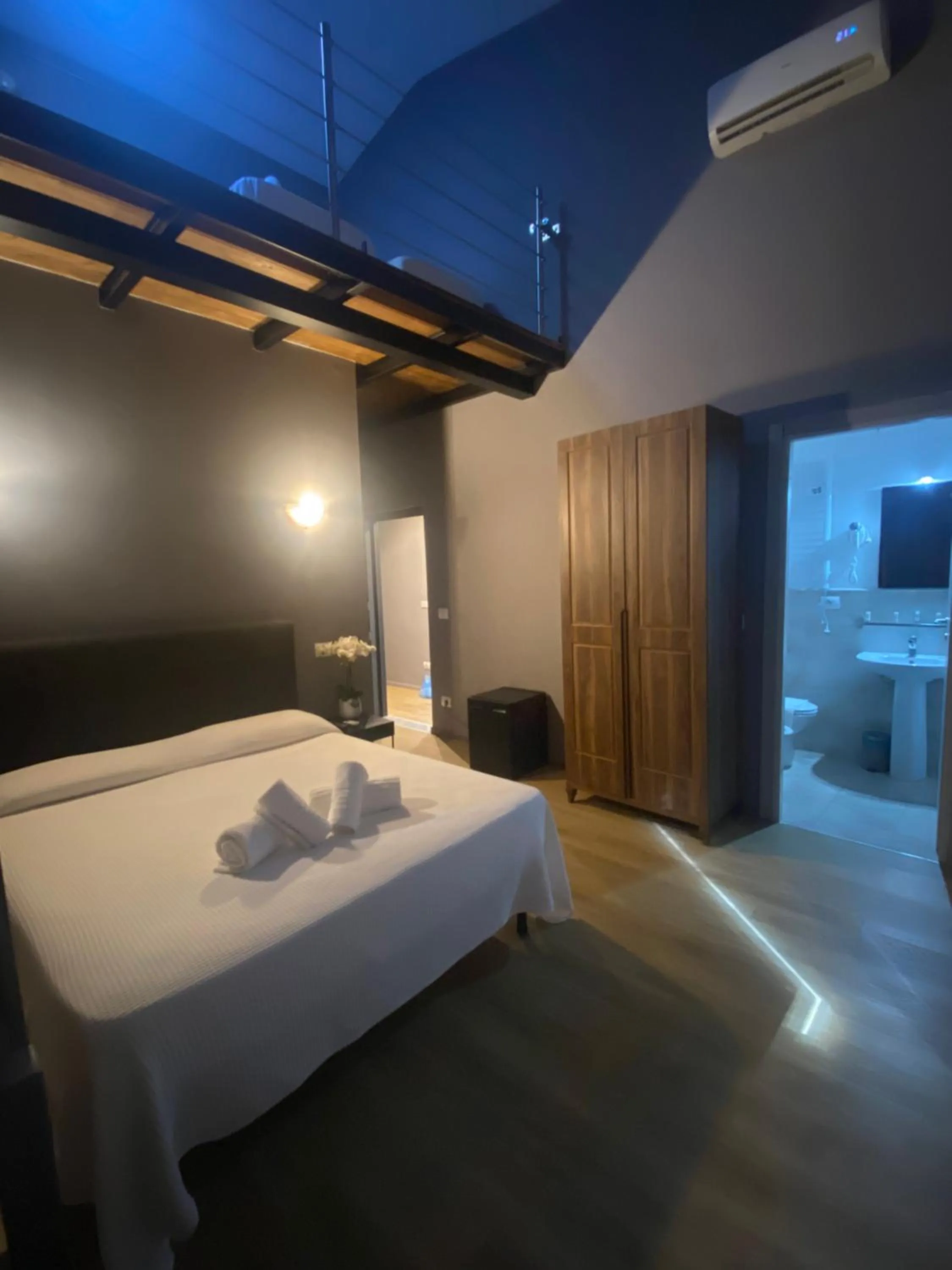 Deluxe Quadruple Room in Palazzo Oliveto