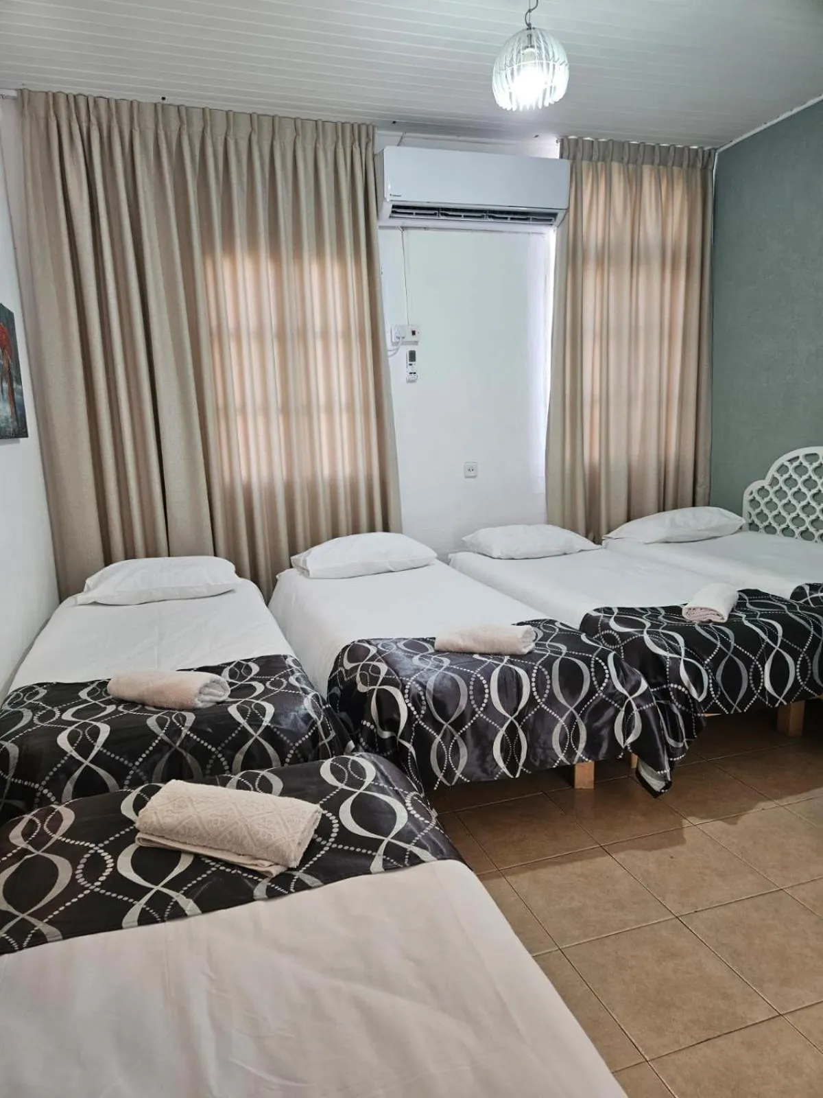 Quintuple Room (5 Adults) in Atara Hotel