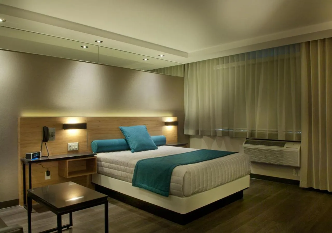 Superior Quadruple Room in Ramada by Wyndham Laval