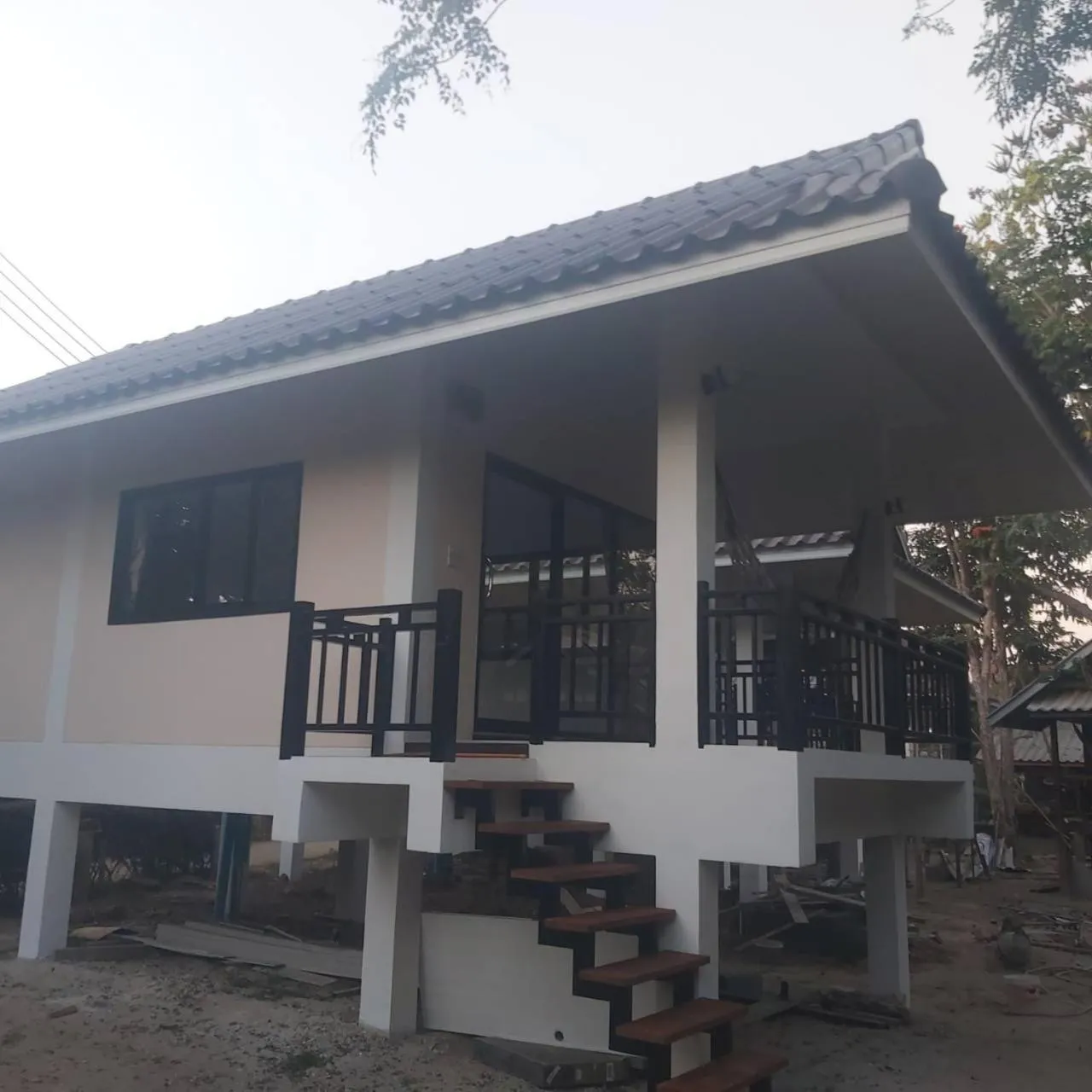 Double Room with Balcony - single occupancy in Family Hut Pai