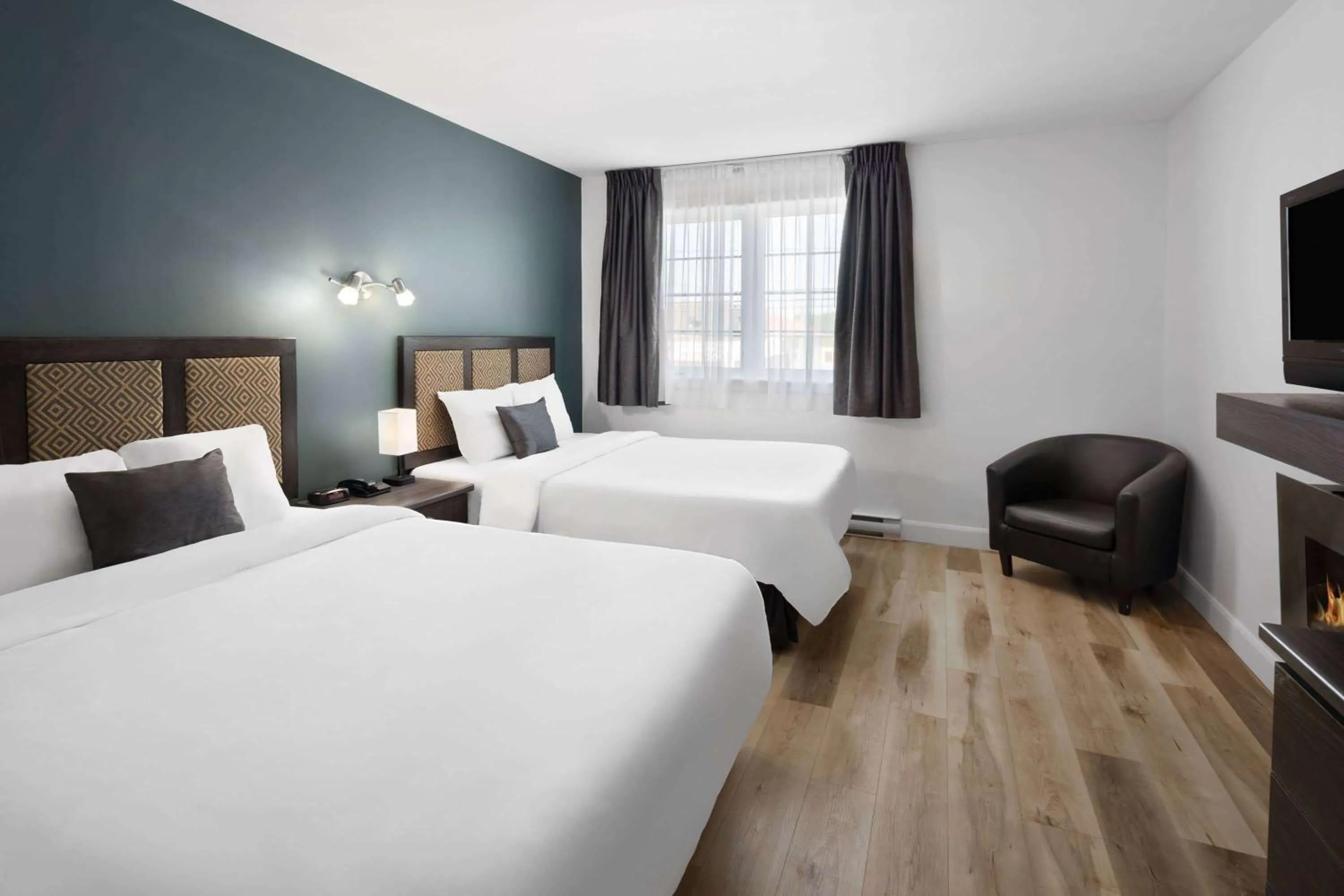 Double Room with Two Double Beds - Non-Smoking in Travelodge by Wyndham Roberval