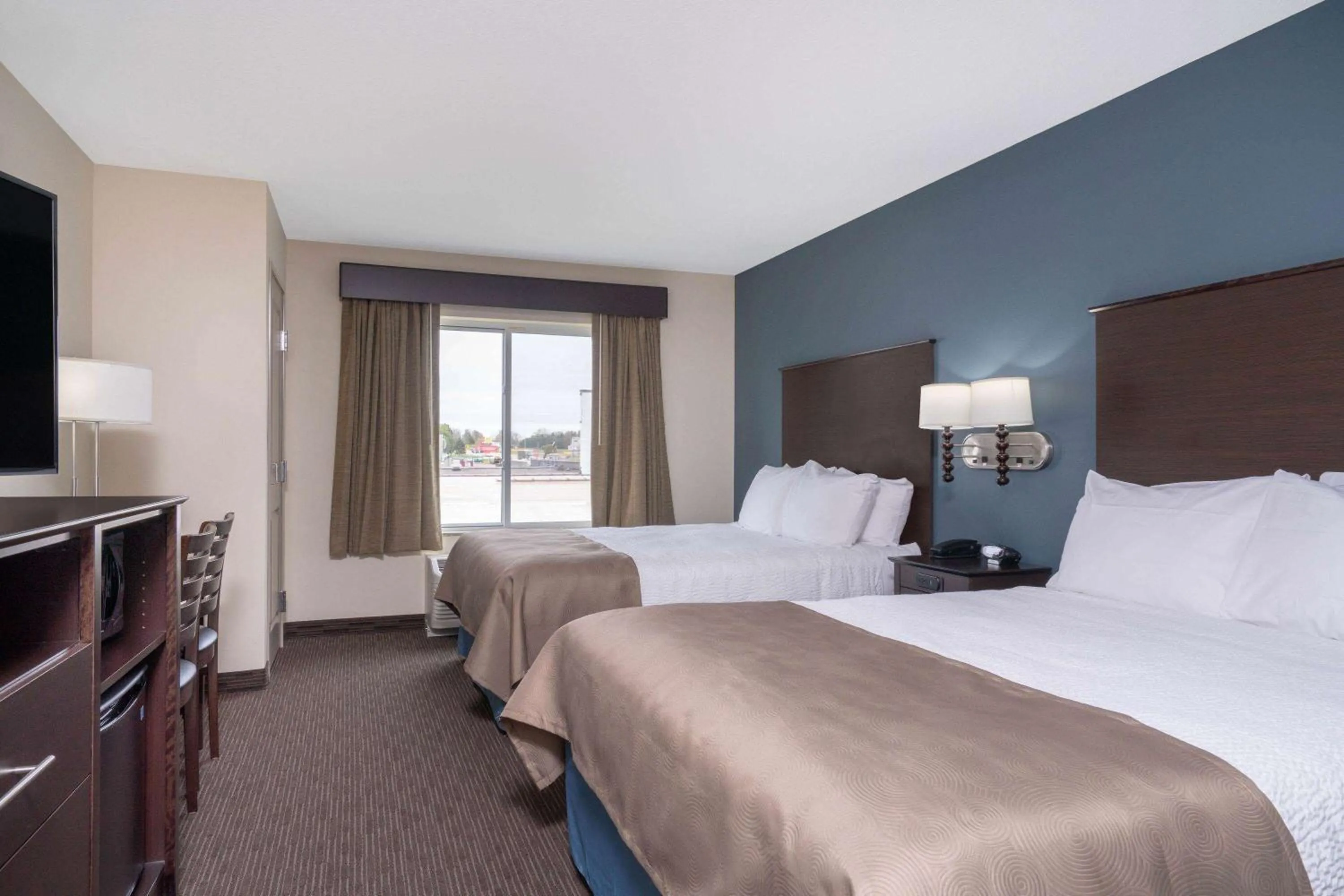 Queen Room with Two Queen Beds - Dog Friendly/Non-Smoking in AmericInn by Wyndham Windom