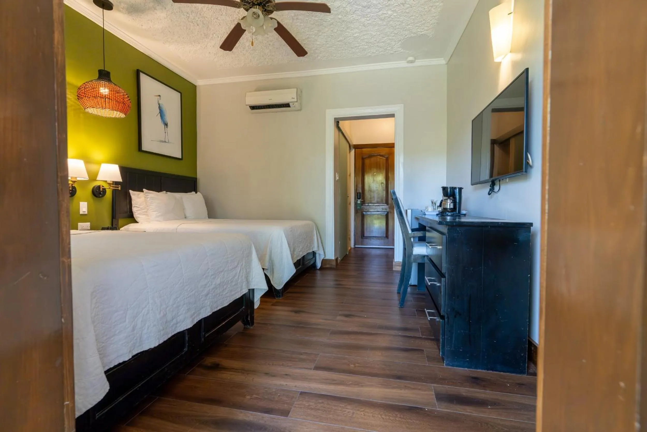 Standard Room, 2 Double Beds Garden View in Travellers Beach Resort