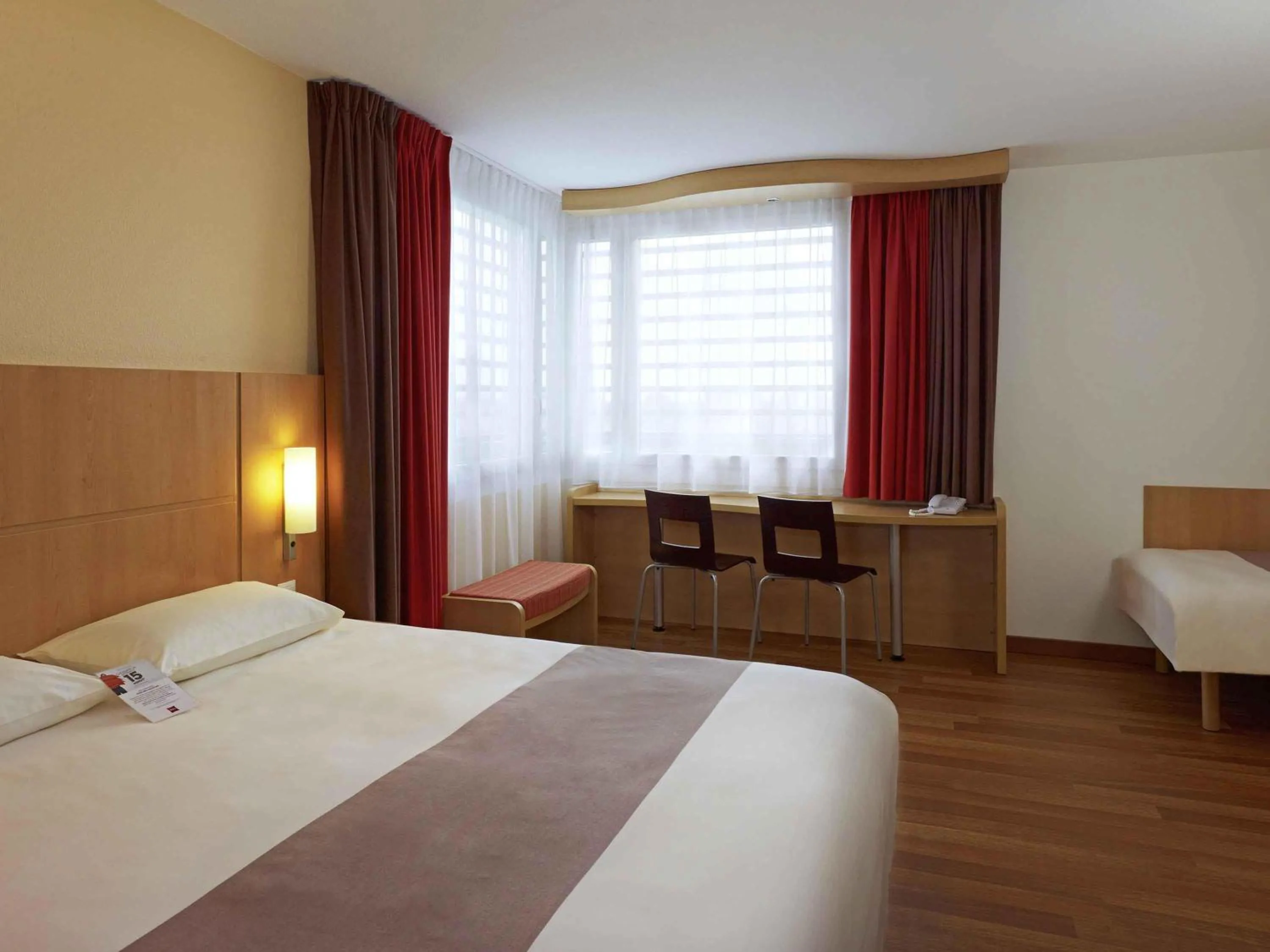 Standard Family Room with One Double Bed and One Single Bed in ibis Warszawa West Station