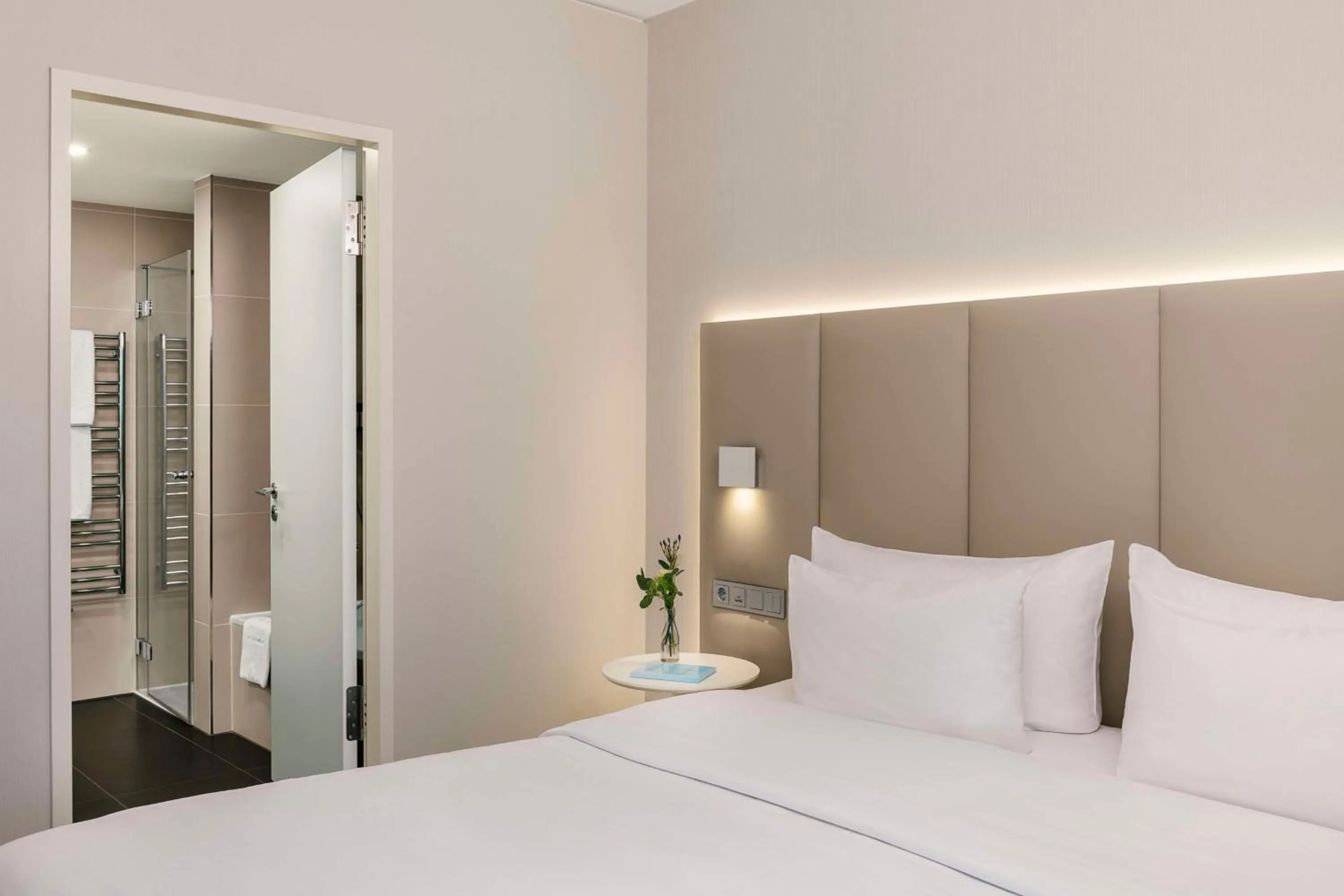 Junior Suite with Extra Bed (2 Adults + 2 Children) in NH Leipzig Zentrum