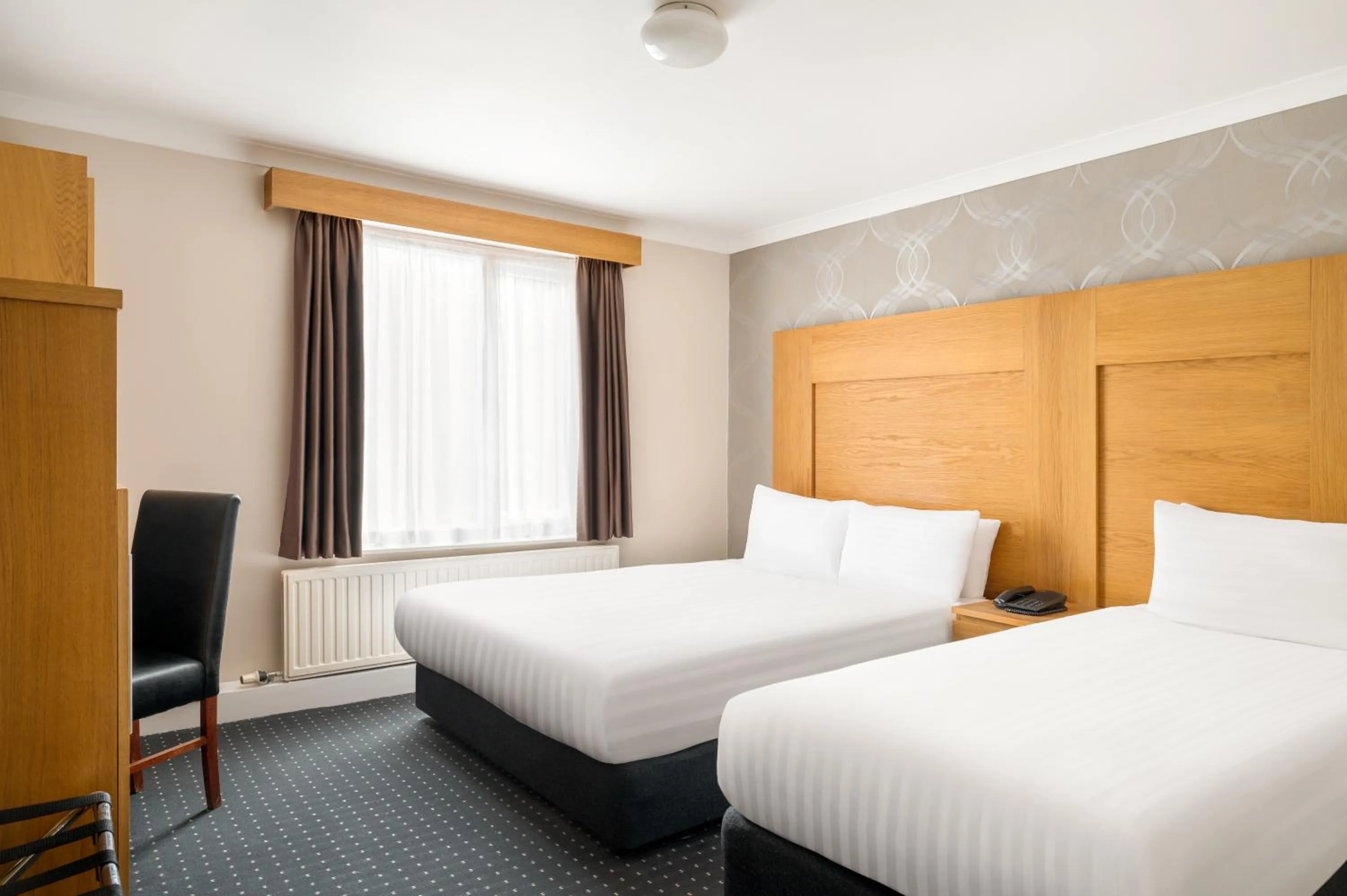 Standard Triple Room in Rooms Inn