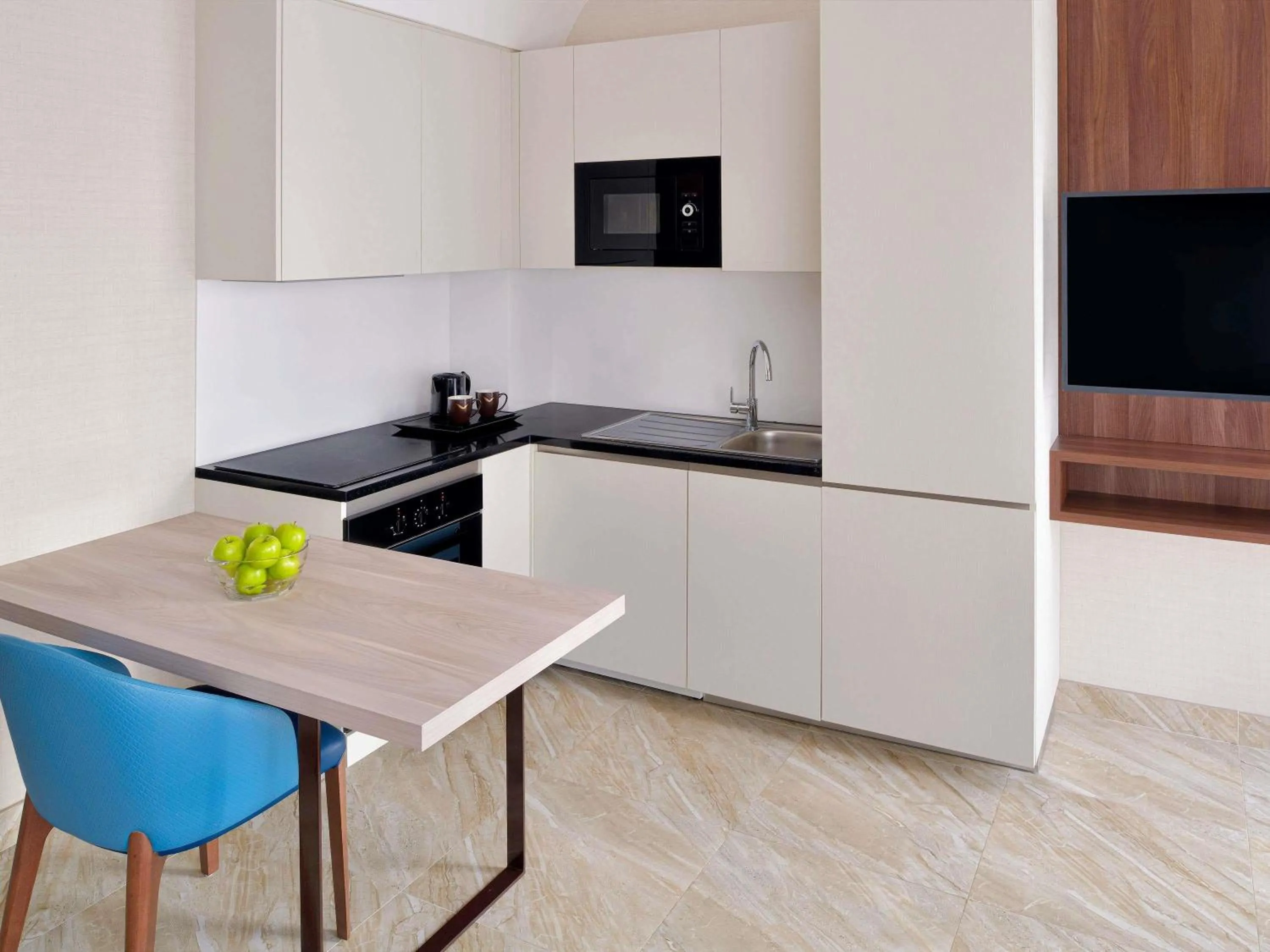 One-Bedroom Apartment - Burj Khalifa view in Mövenpick Hotel Apartments Downtown Dubai