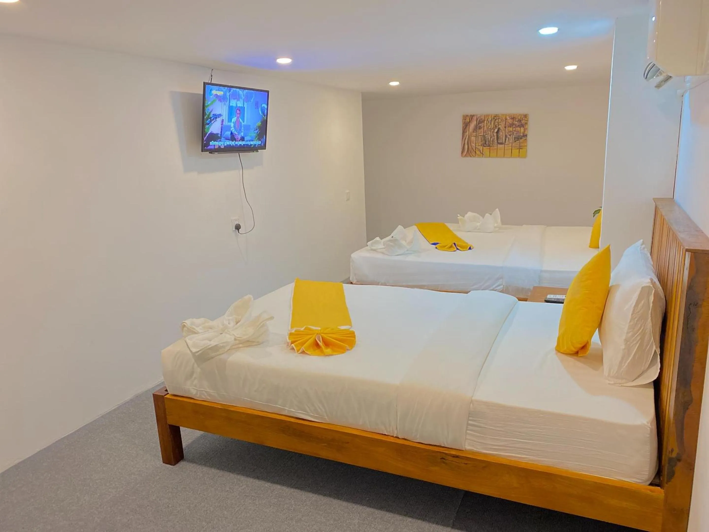 Basic Triple Room with Shared Bathroom in Grand Elevation Hotel