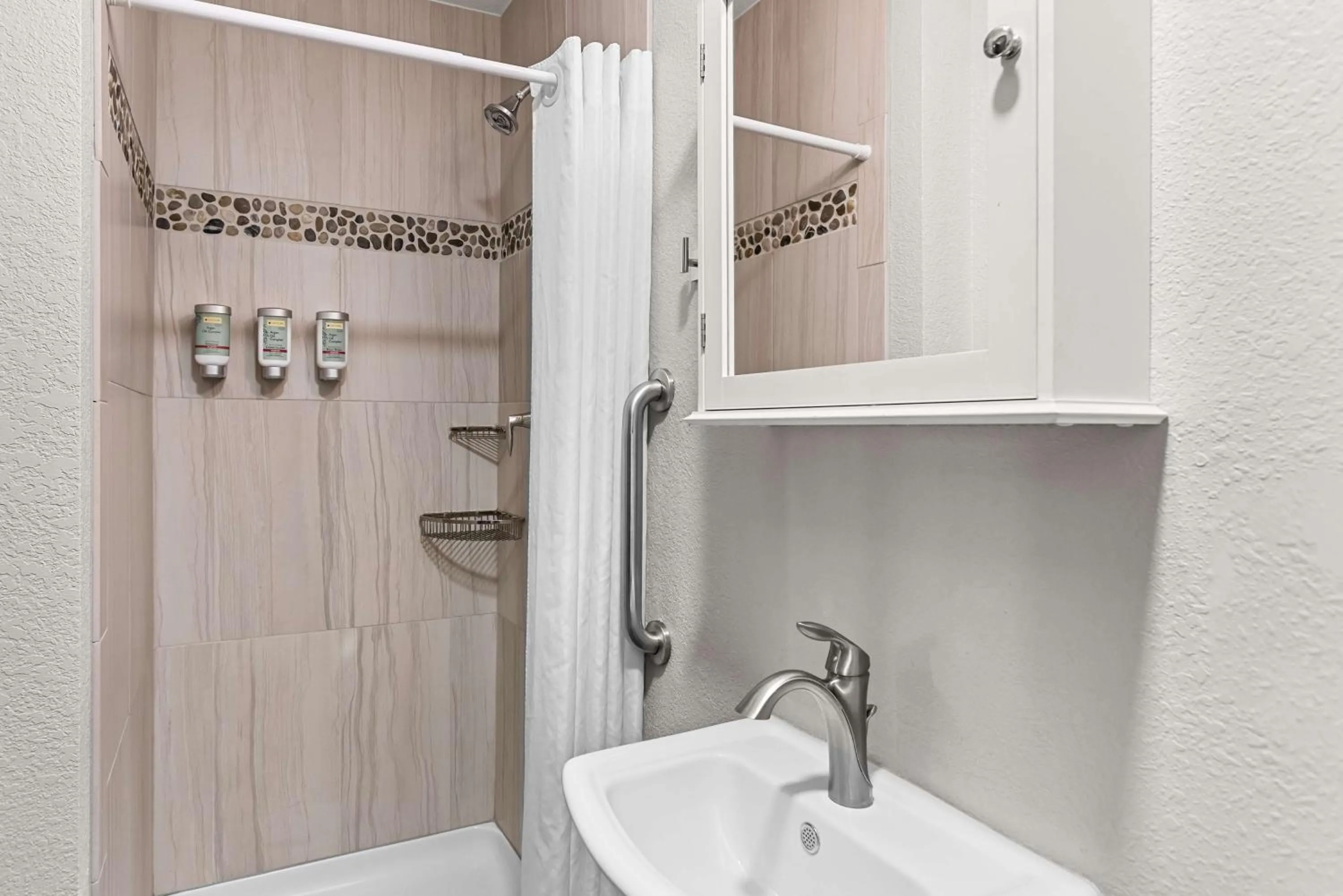 King Suite with Sofa Bed and Fireplace in Best Western of Harbor Springs