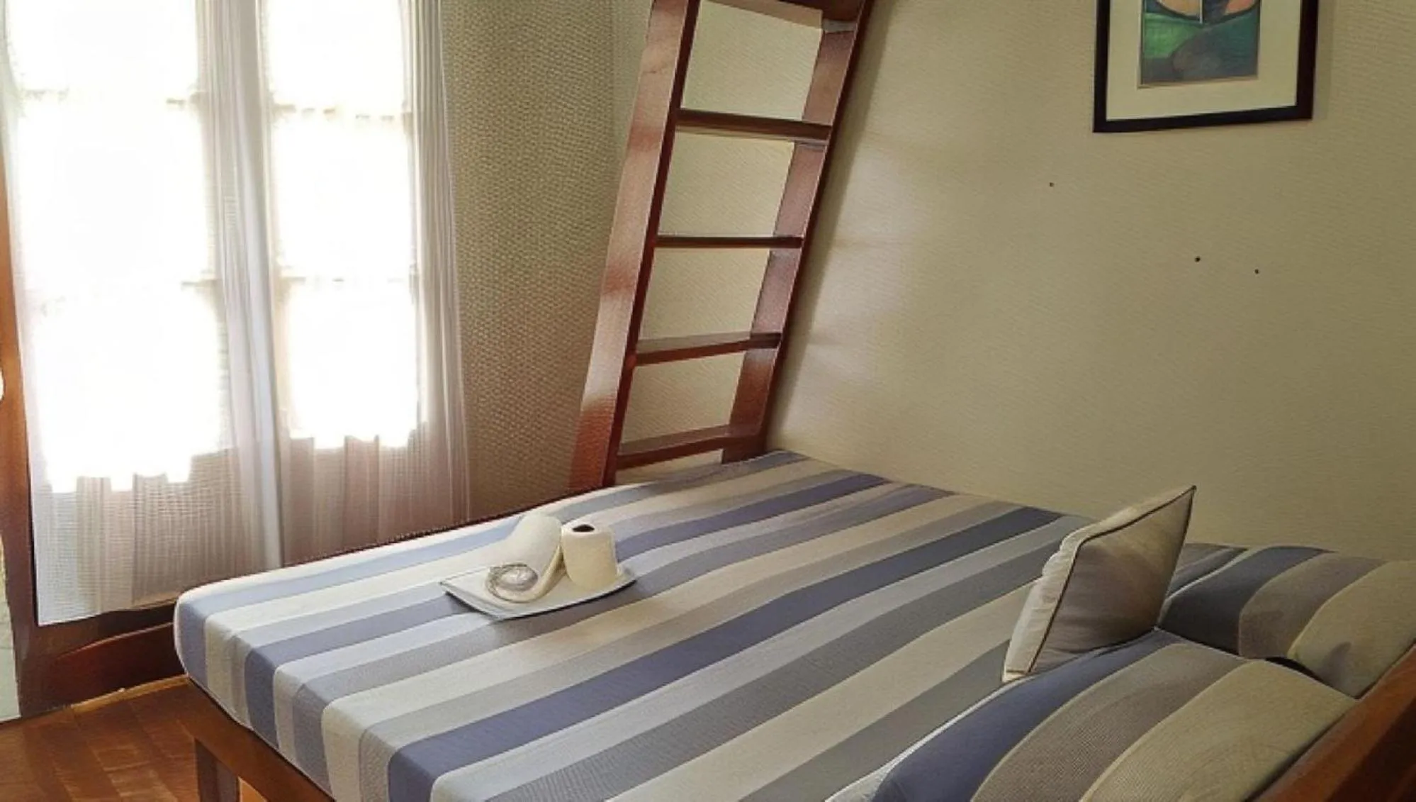 Double Room in UrbanView BNKY Bed and Breakfast Palawan by RedDoorz