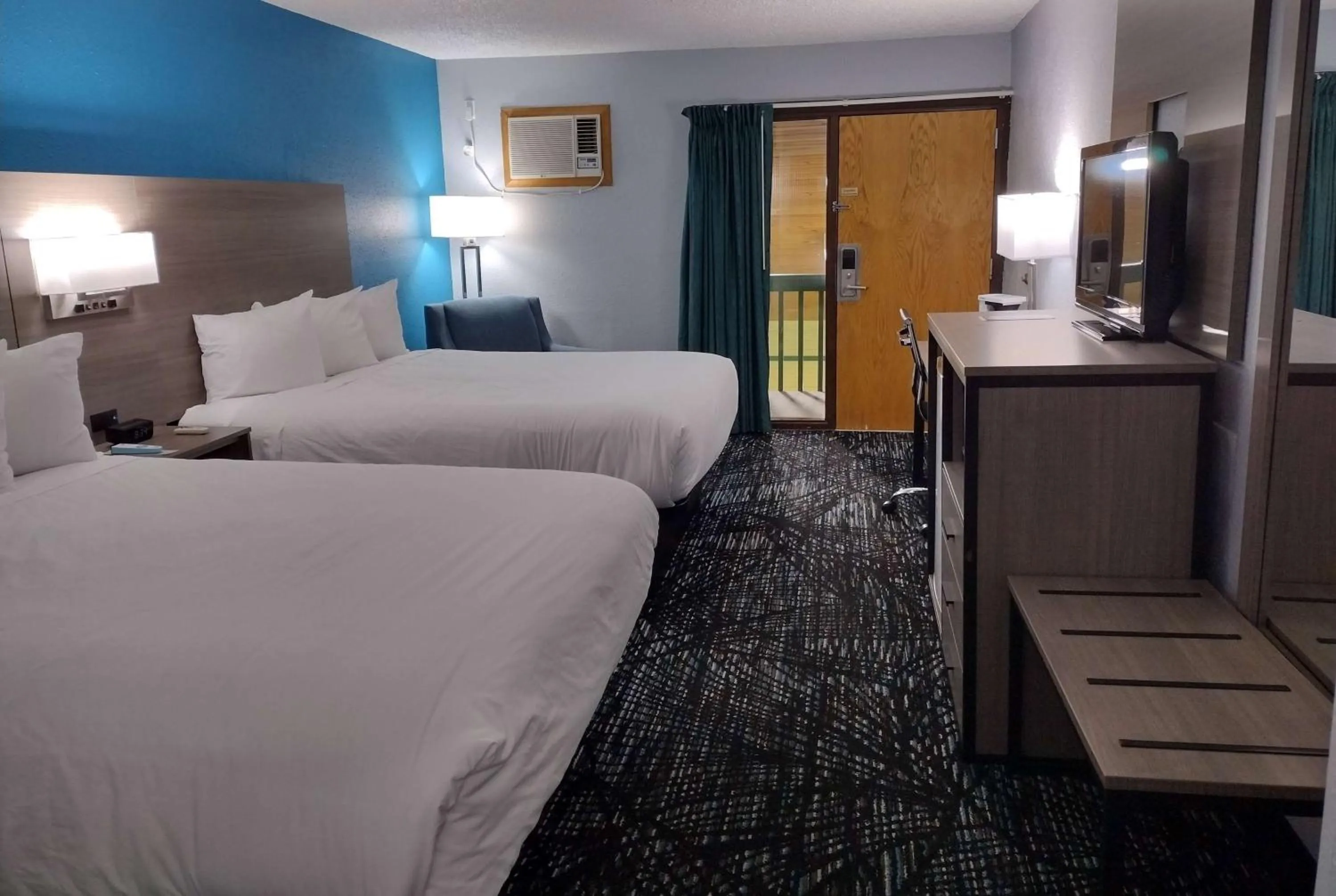 Queen Room with Two Queen Beds and Pool View - Non-Smoking in Baymont by Wyndham Proctor