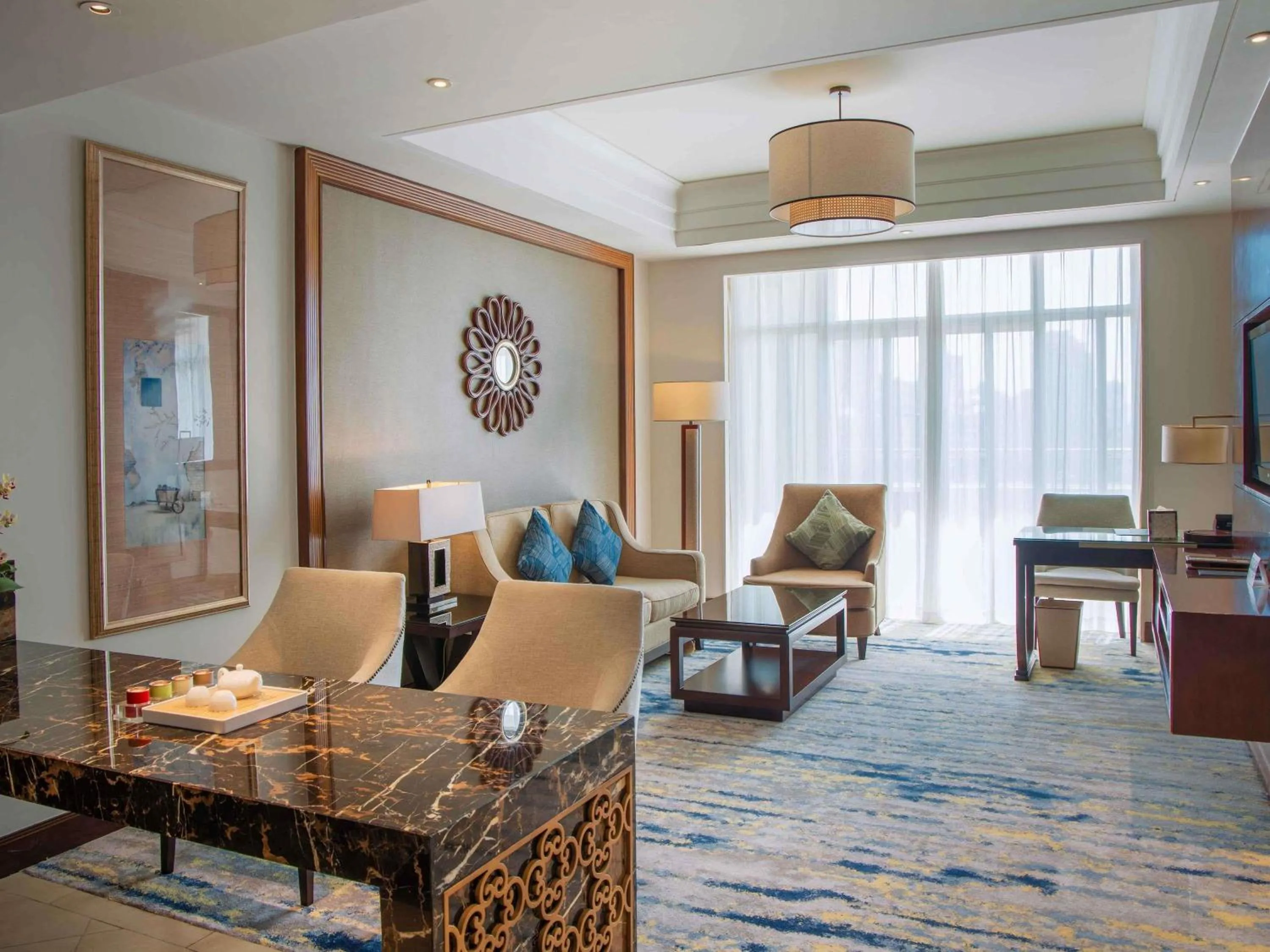 Deluxe King Suite with Sea View and Balcony in Pullman Haikou