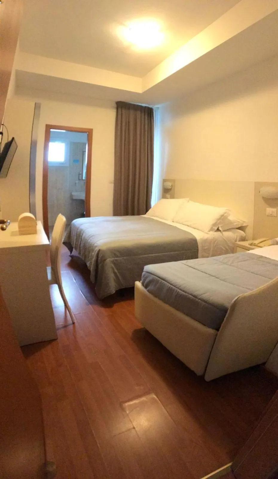 Classic Triple Room in Hotel Butterfly Wellness & Spa