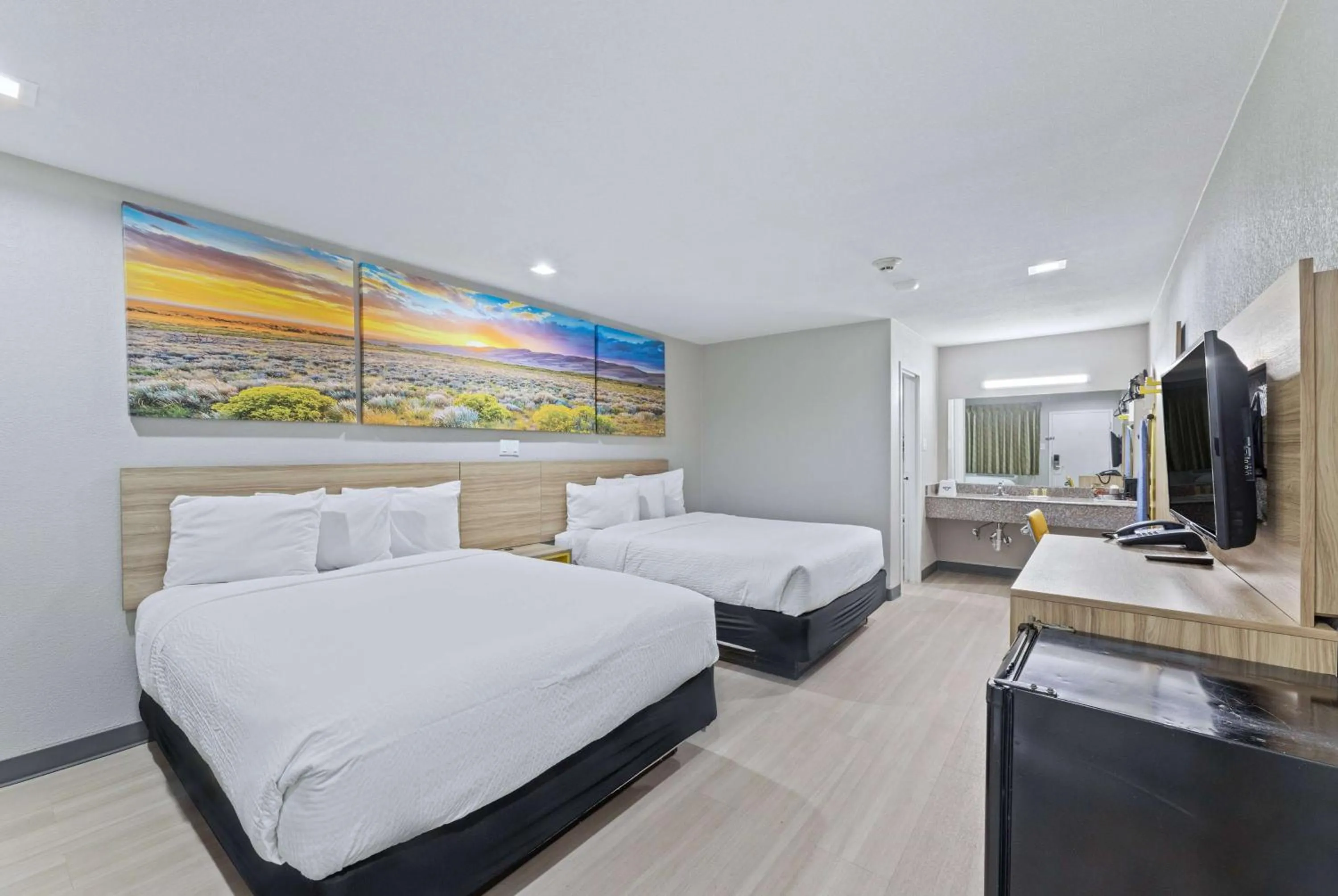 Queen Room with Two Queen Beds - Non-Smoking in Days Inn by Wyndham McKinney