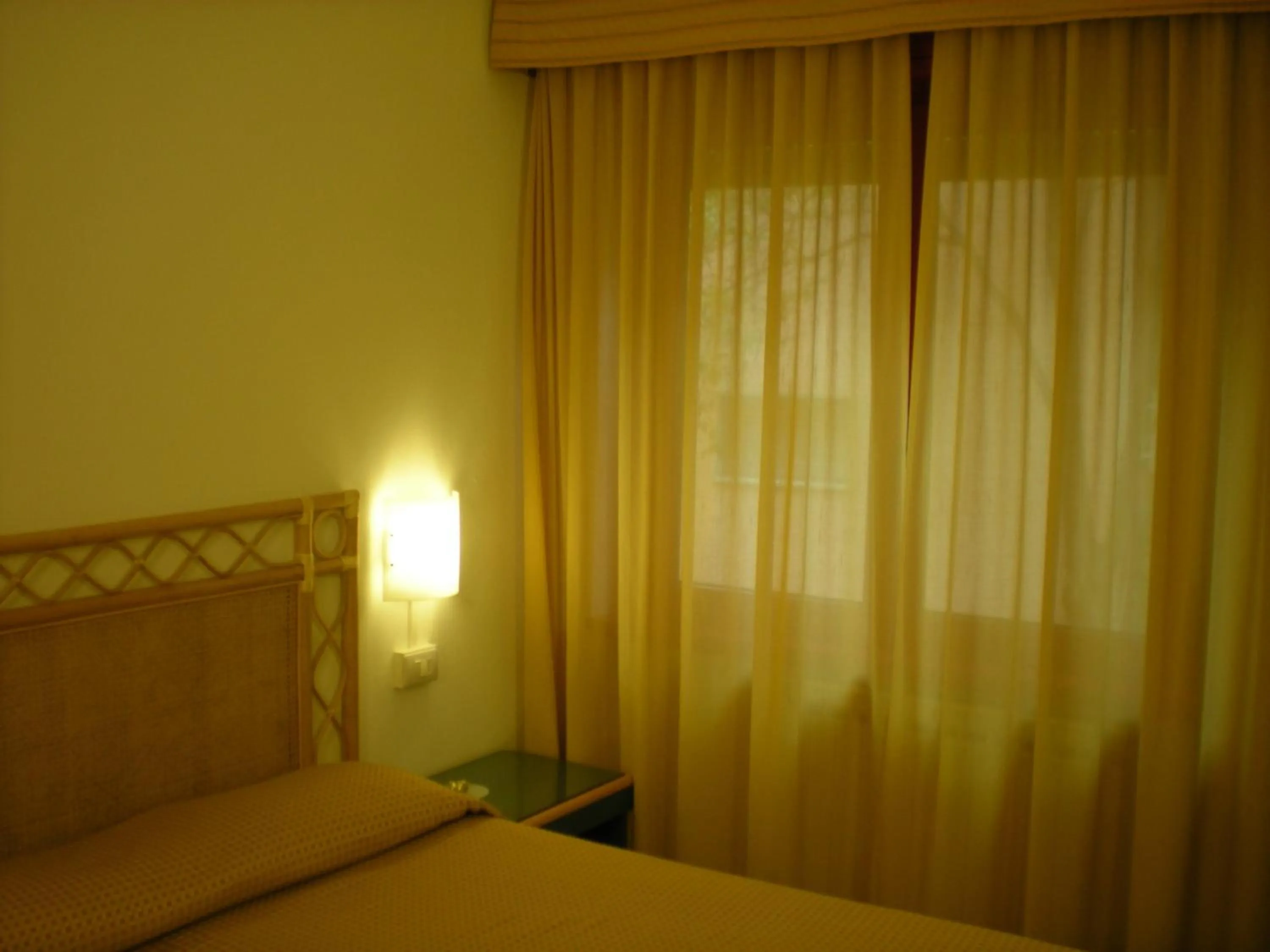 Double Room with Extra Bed (2 Adults + 2 Child) in Hotel Palme
