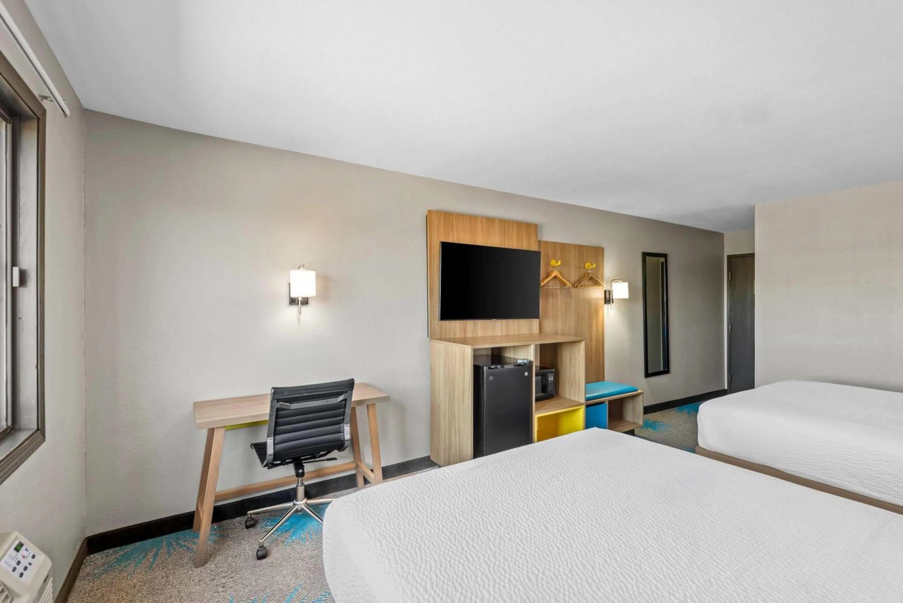Queen Room with Two Queen Beds - Non-Smoking in Days Inn & Suites by Wyndham Des Moines Airport