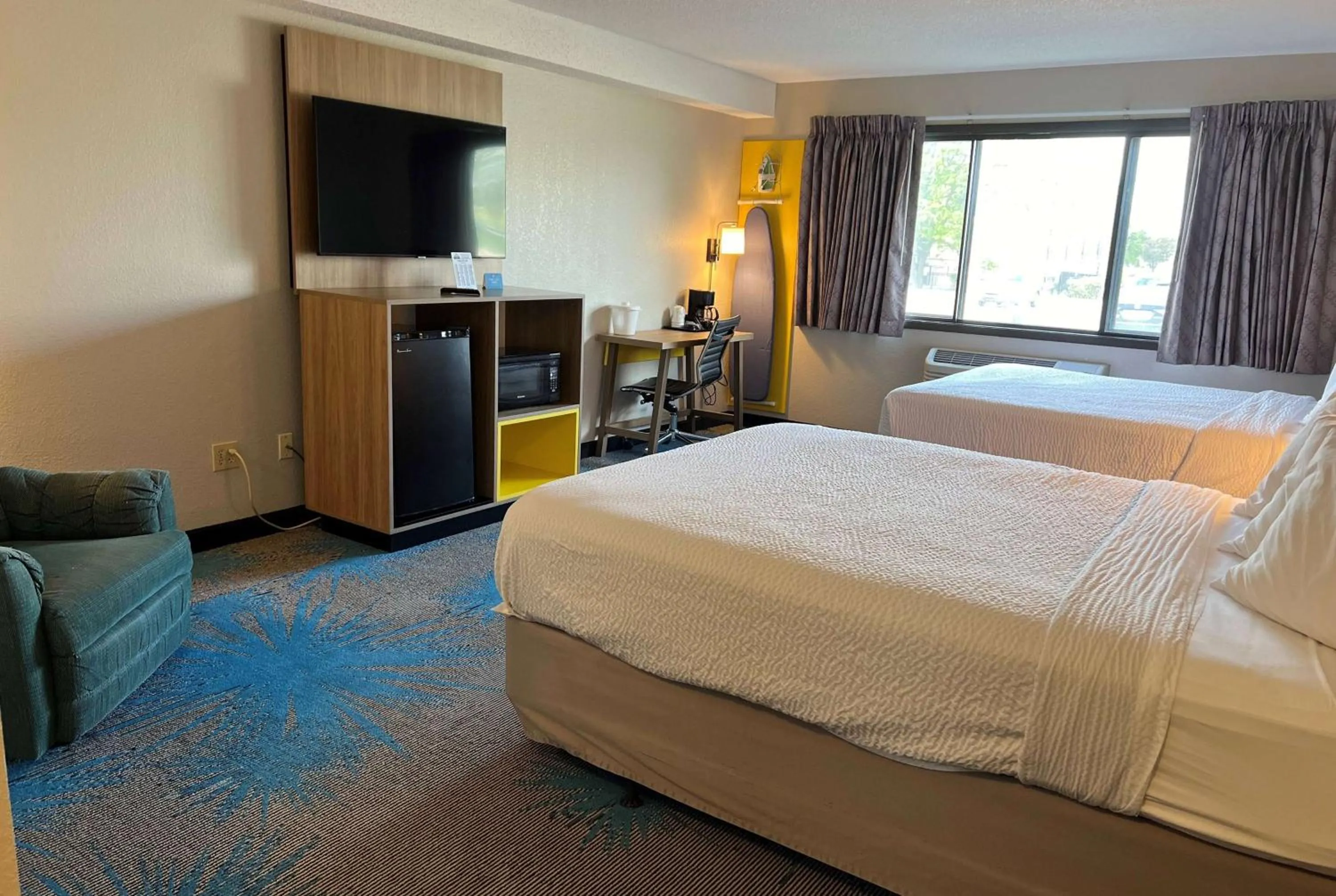 Queen Room with Two Queen Beds - Non-Smoking in Days Inn & Suites by Wyndham Des Moines Airport