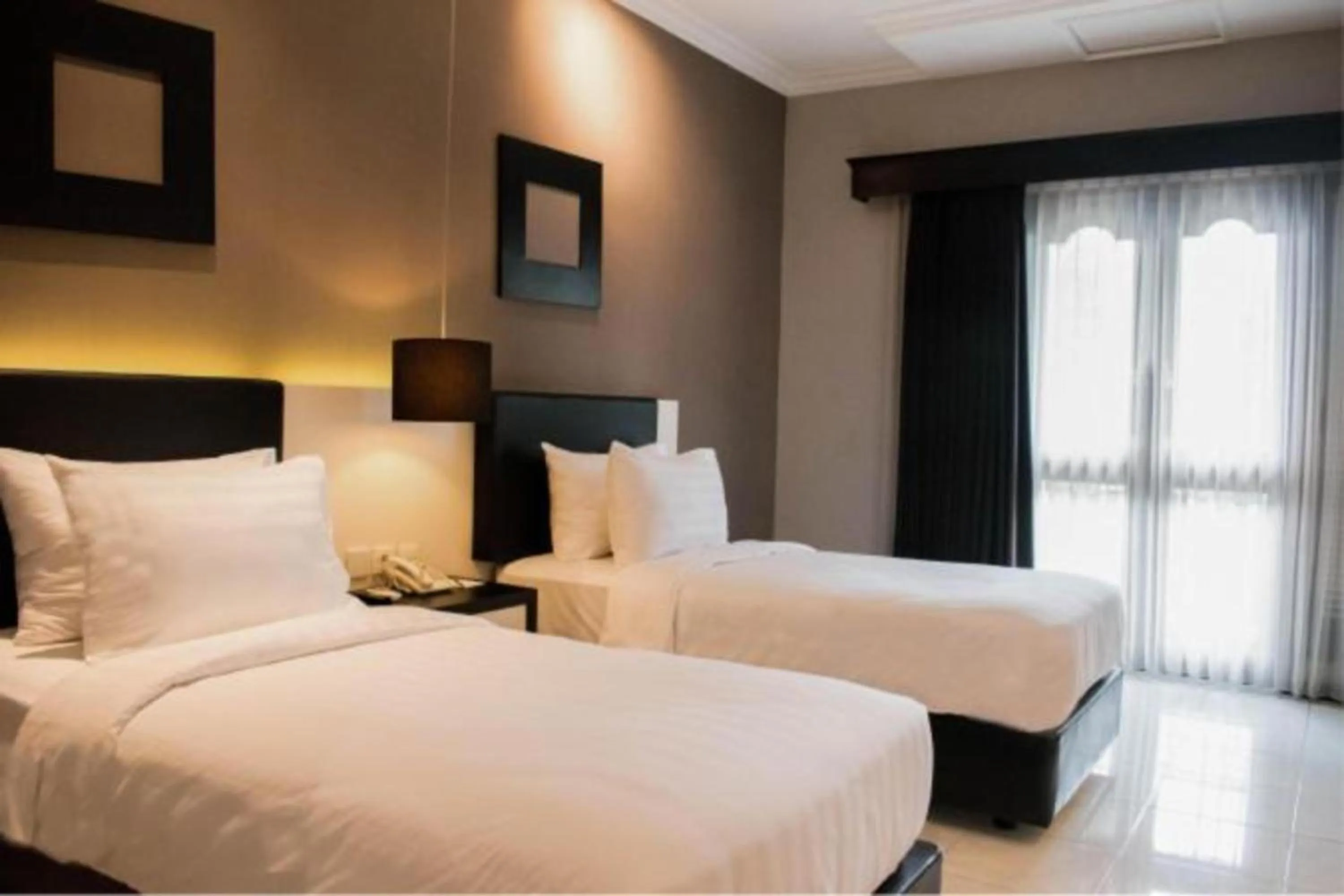 Deluxe Double or Twin Room in Luminor Hotel Jember By WH