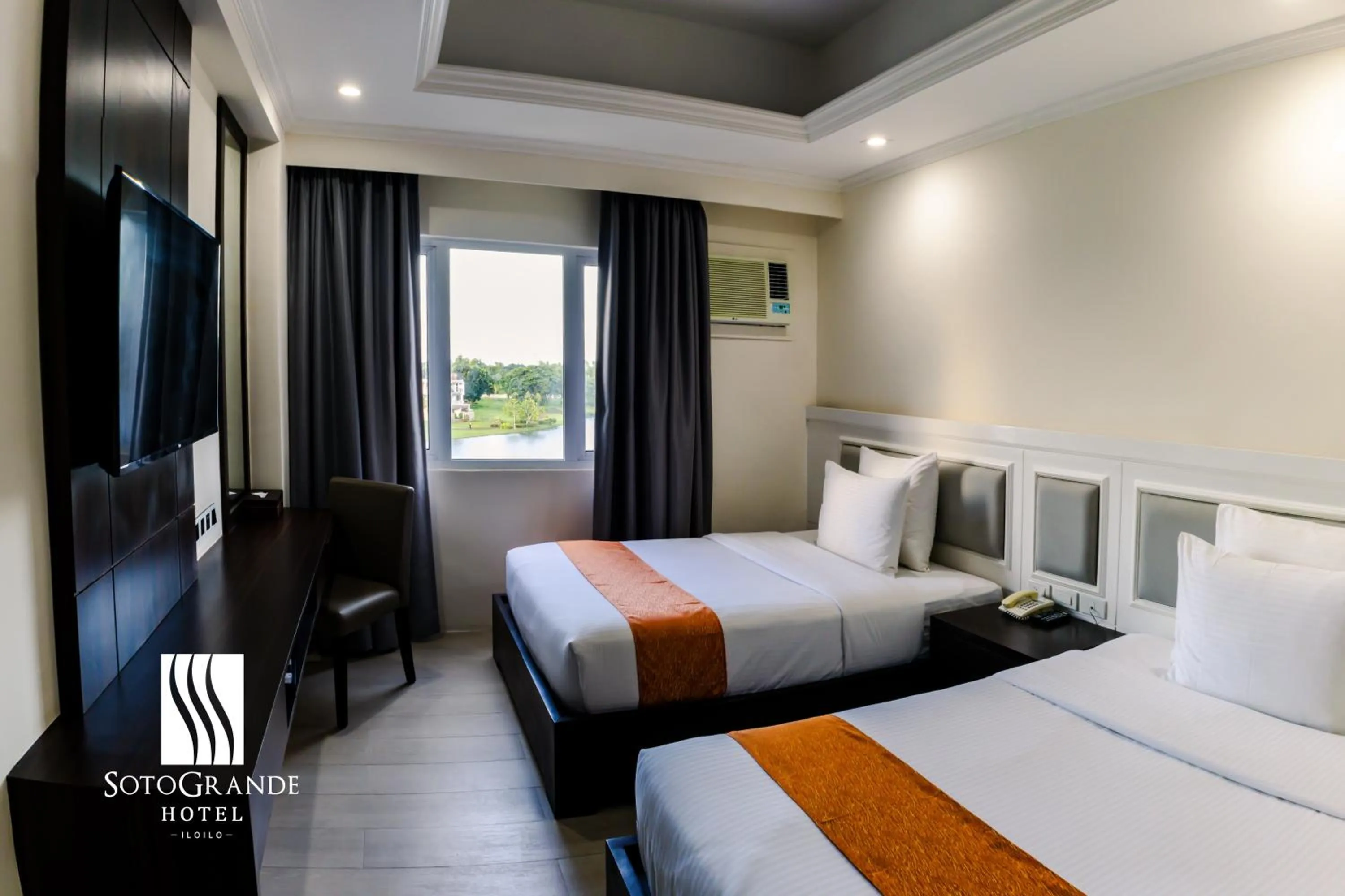 Deluxe Double or Twin Room with Lake View in Sotogrande Iloilo Hotel