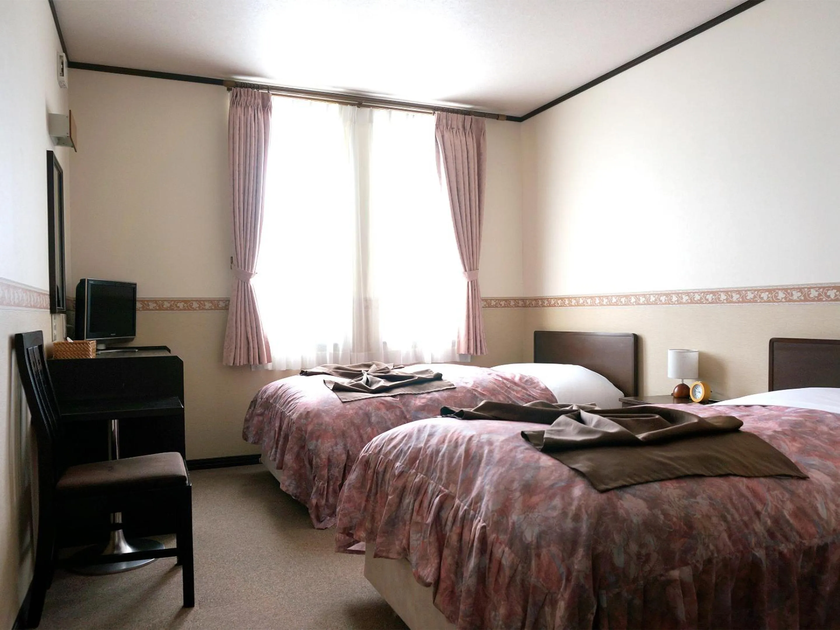 Twin Room in Petit Hotel Blaneneige