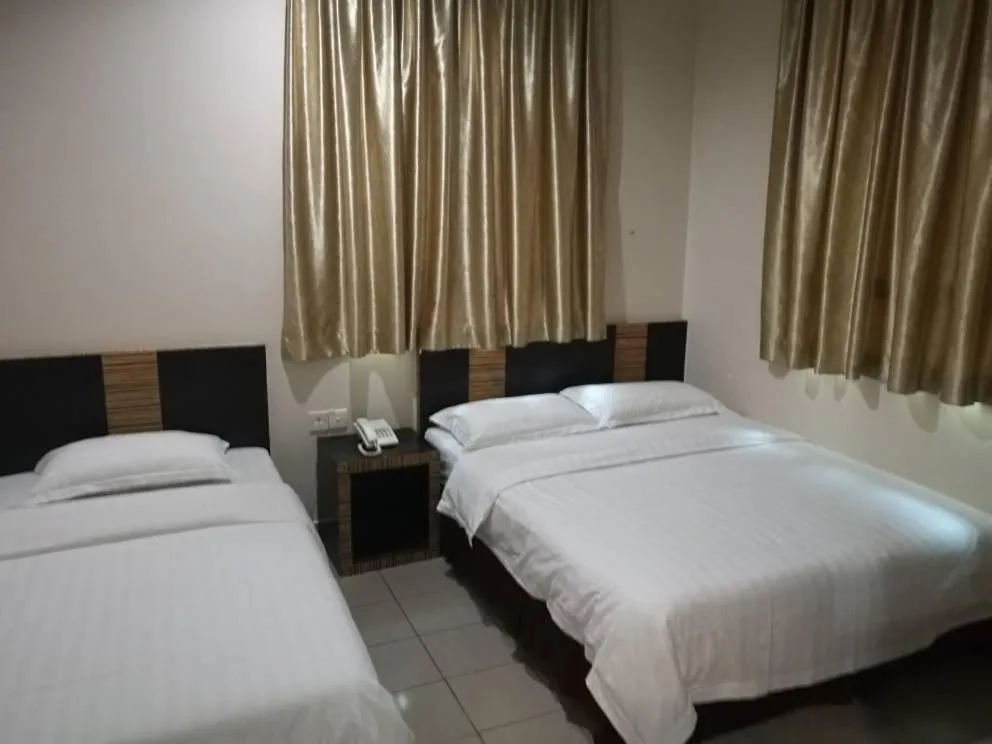 Family Room (3 Adults) in Hotel Traveller