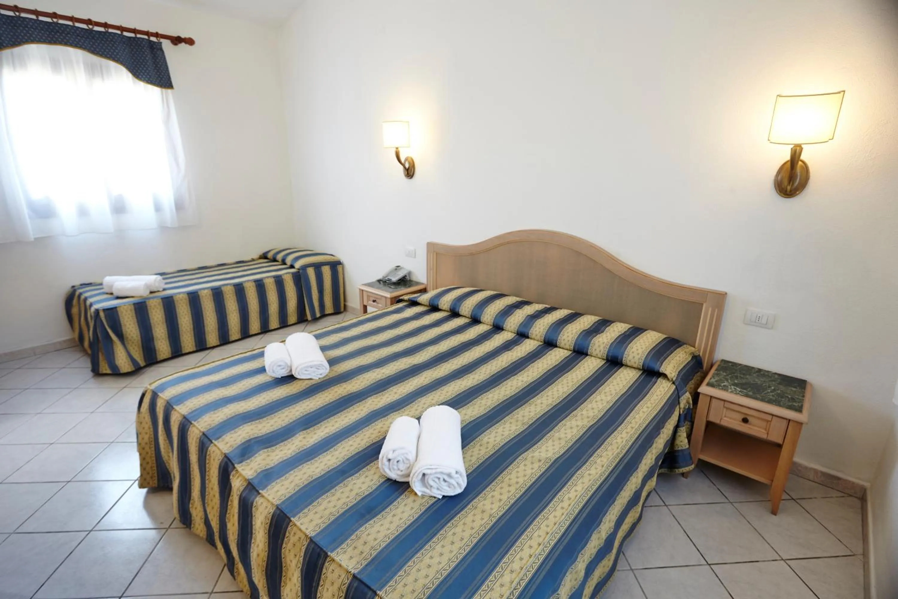 Classic Triple Room in Hotel Cala Mirto