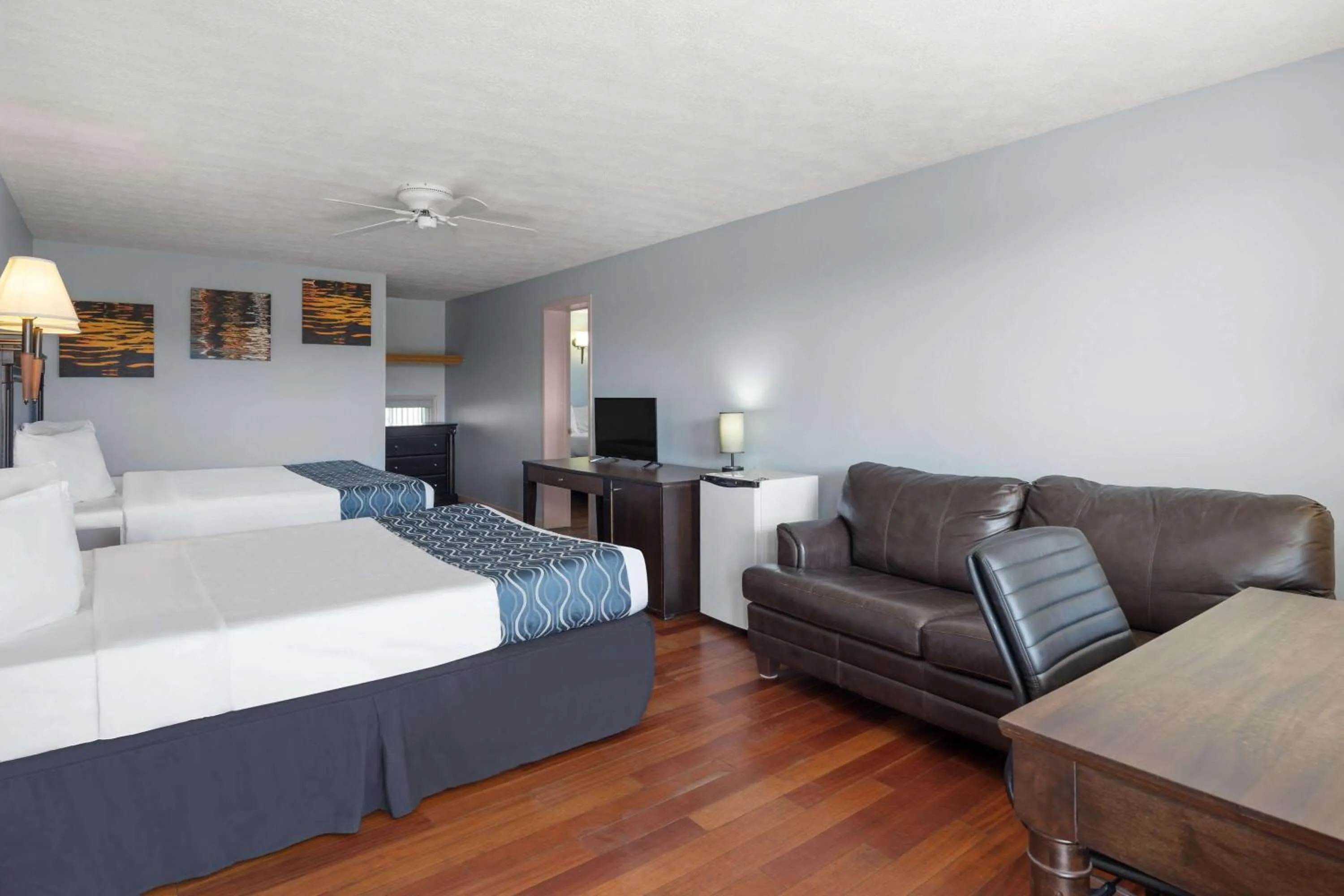 Two-Bedroom Family Suite with Three Queen Beds and Mountain View - Non-Smoking in Travelodge by Wyndham Grand Falls