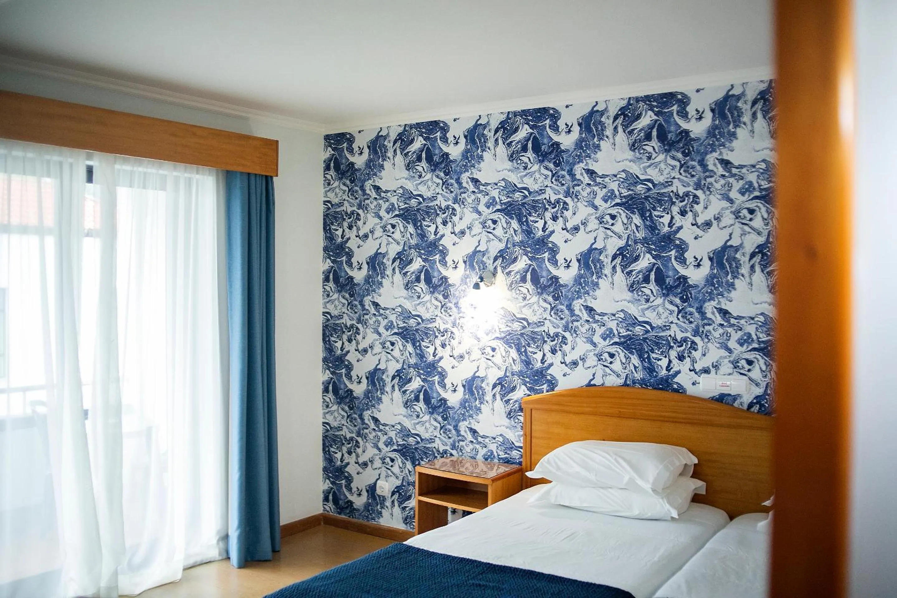 Twin Room with Partial Sea View - single occupancy in Hotel do Mar