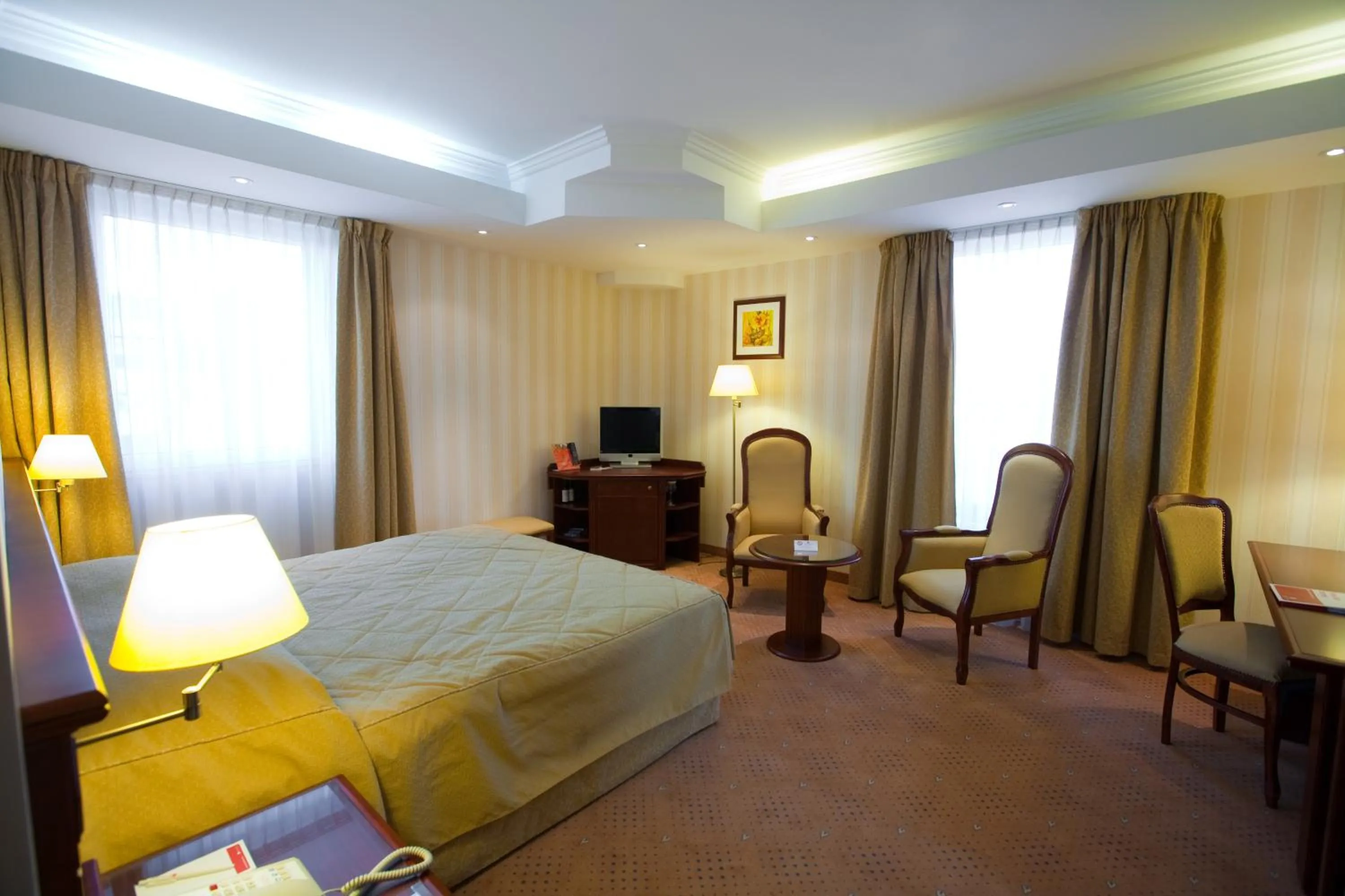 Business Room with One King Bed - Non-Smoking in Ramada Hotel & Suites by Wyndham Bucharest North