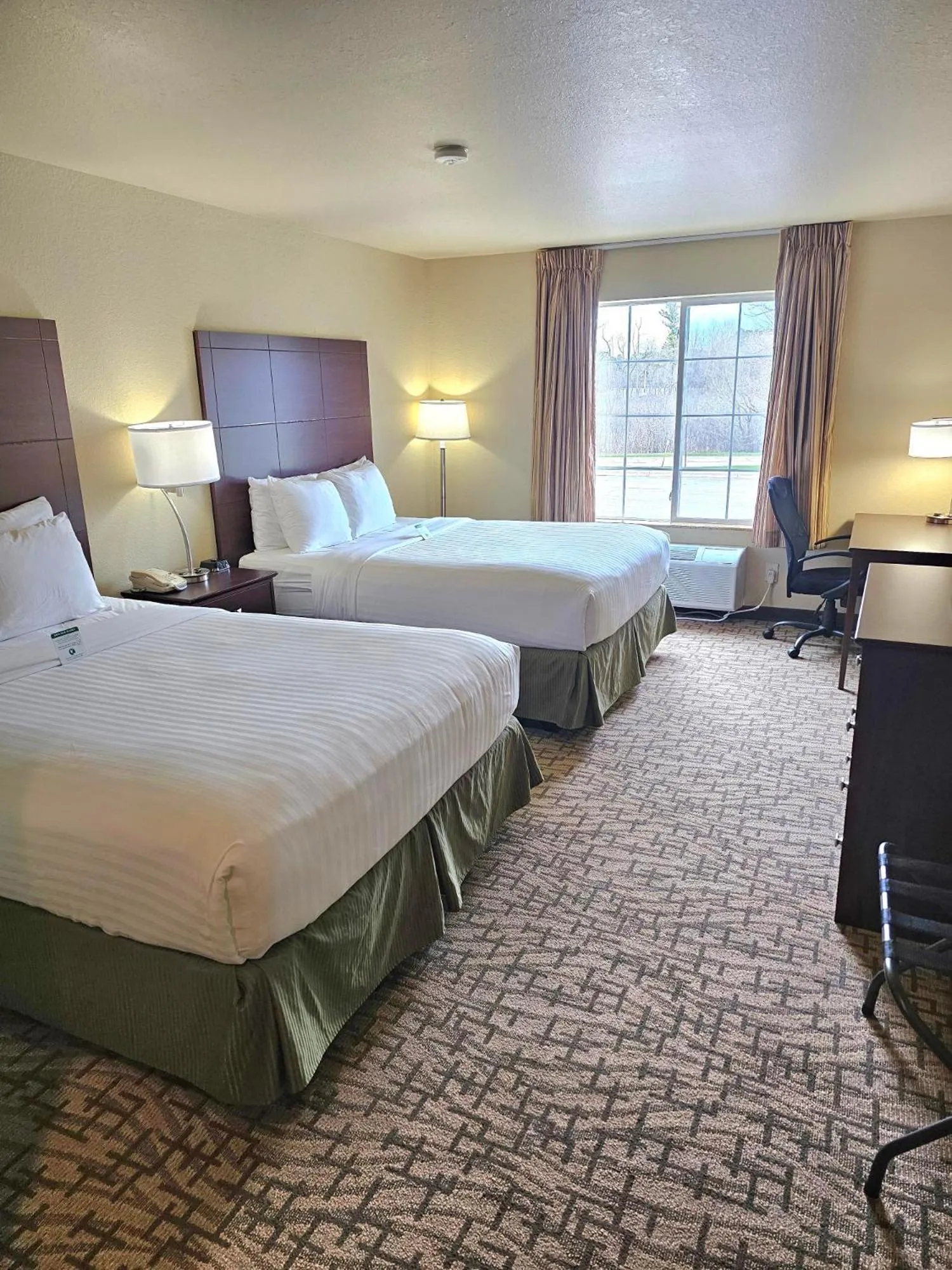 Queen Room with Two Queen Beds - Non-Smoking in Cobblestone Inn & Suites - Clintonville