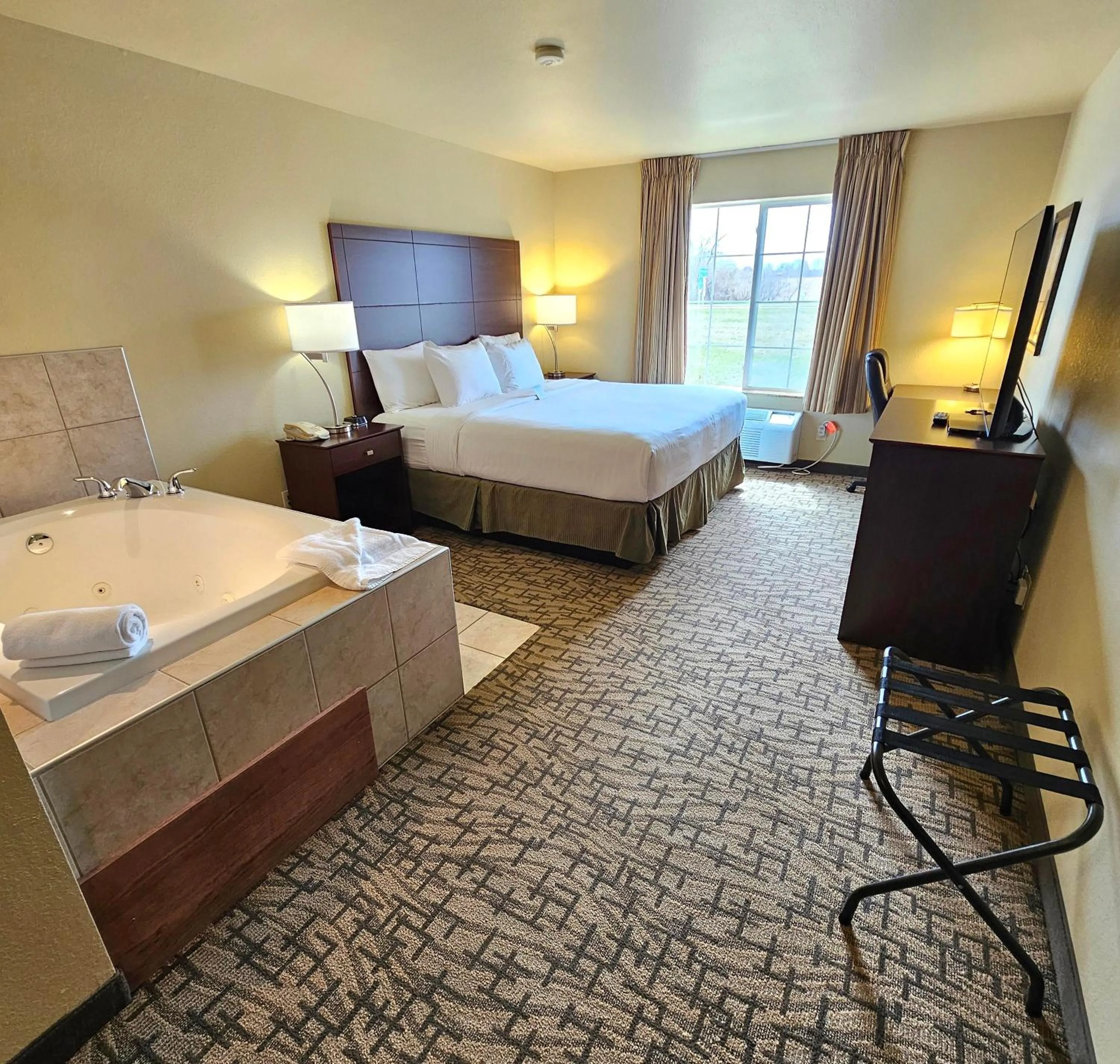 King Suite with Spa Bath - Non-Smoking in Cobblestone Inn & Suites - Clintonville