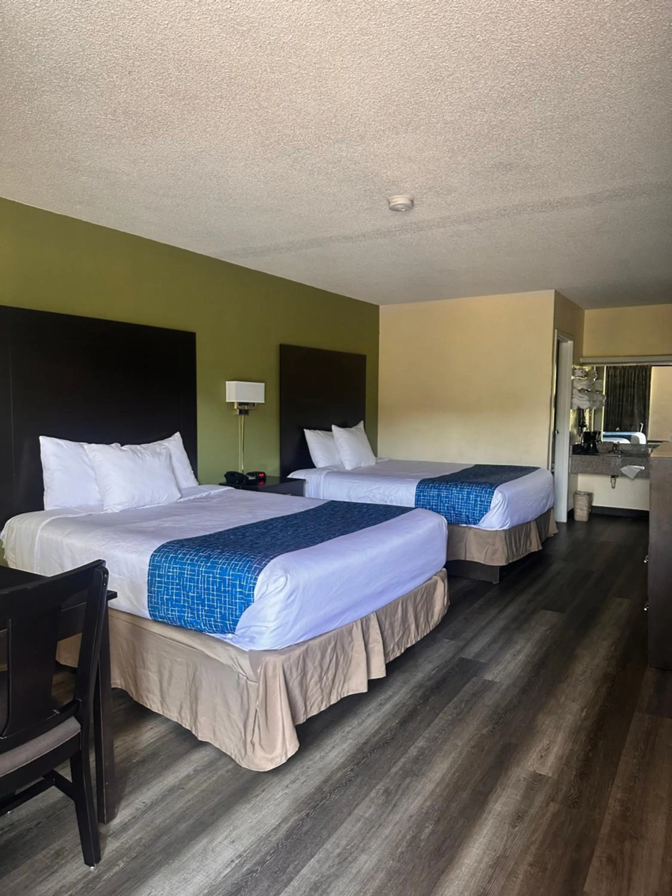 Queen Room with Two Queen Beds - Smoking in Travelodge by Wyndham Clarksville