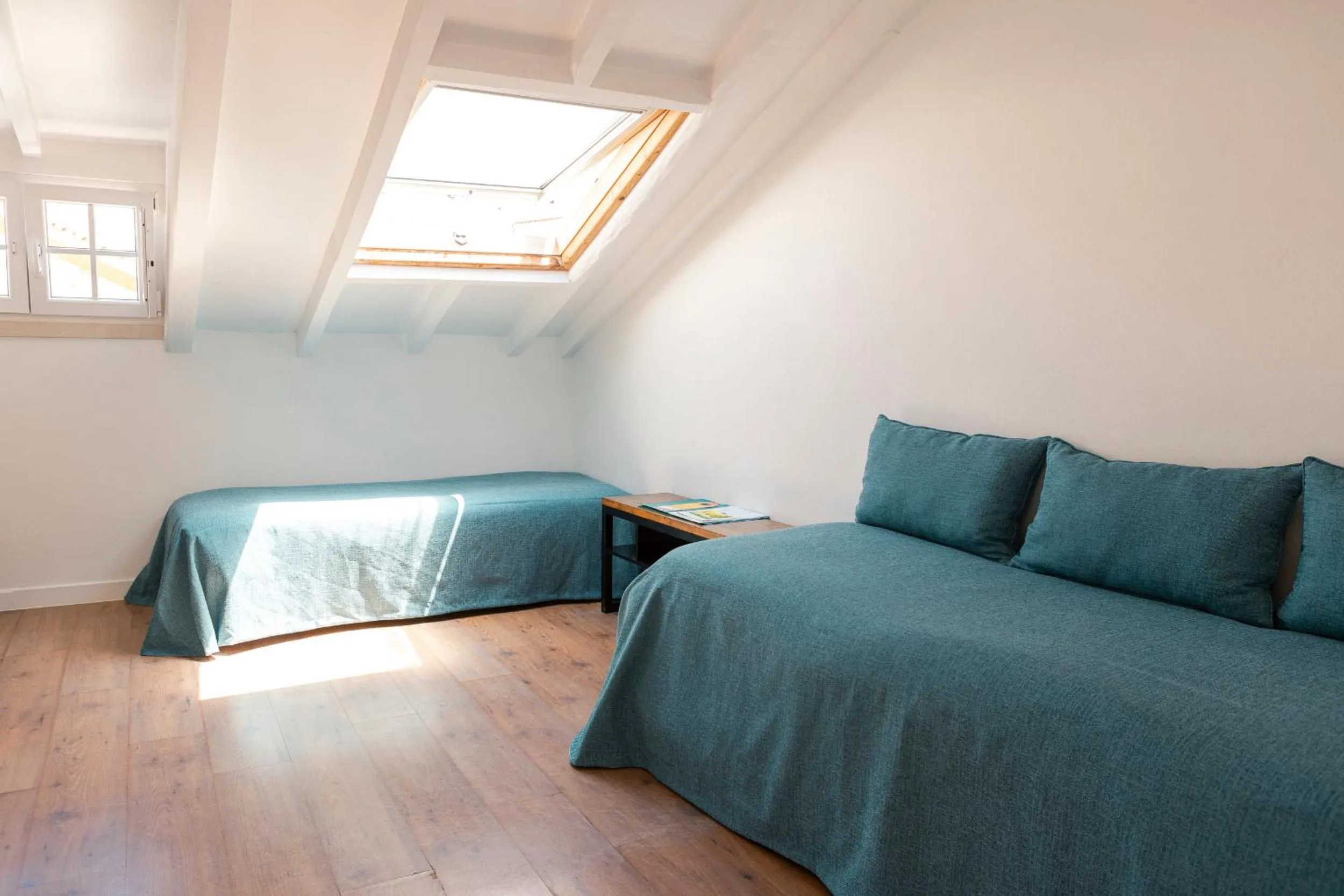 Economy Triple Room - single occupancy in Casa das Aguarelas