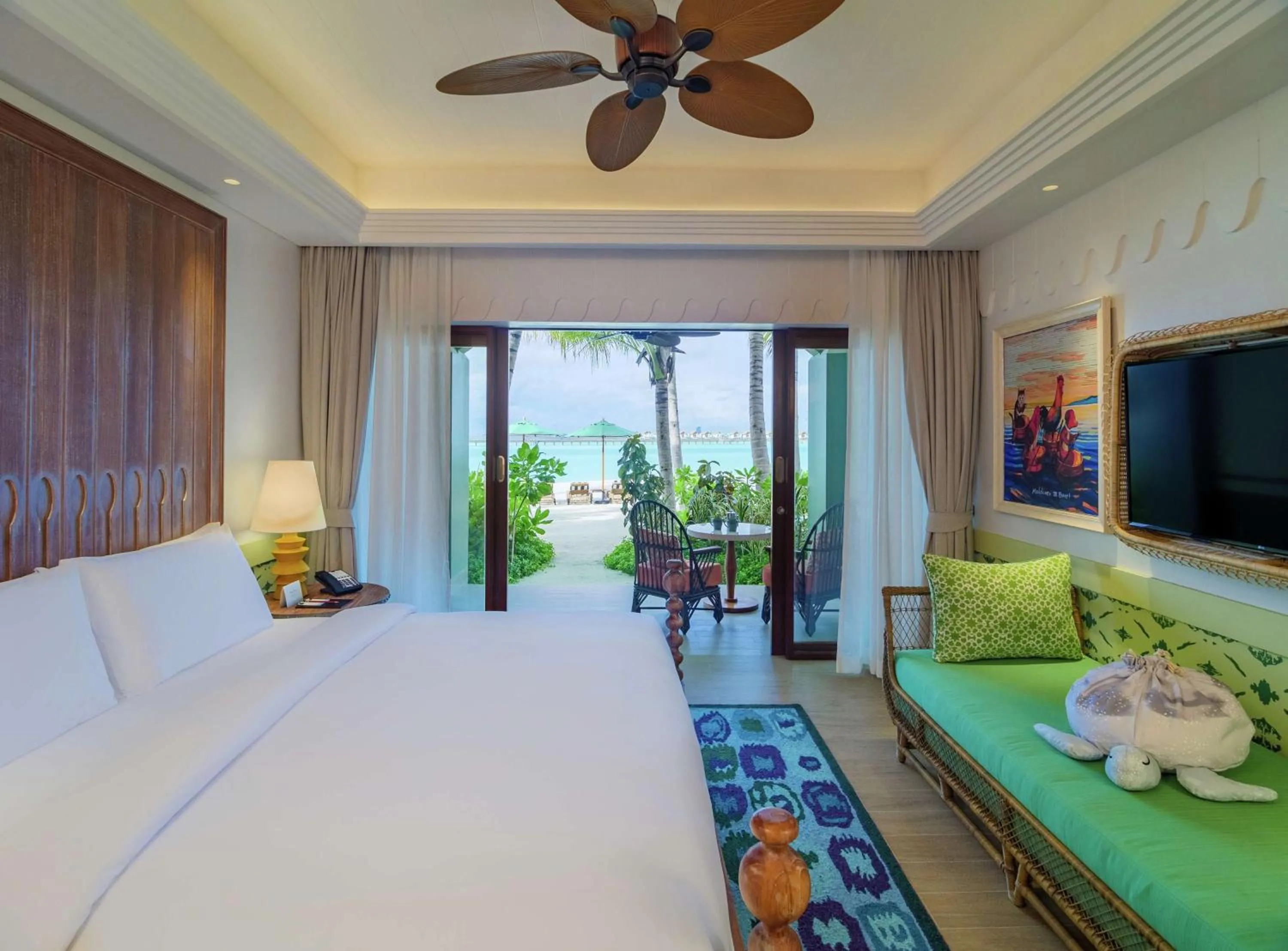 Connecting Family Beach Room in SAii Lagoon Maldives, Curio Collection By Hilton